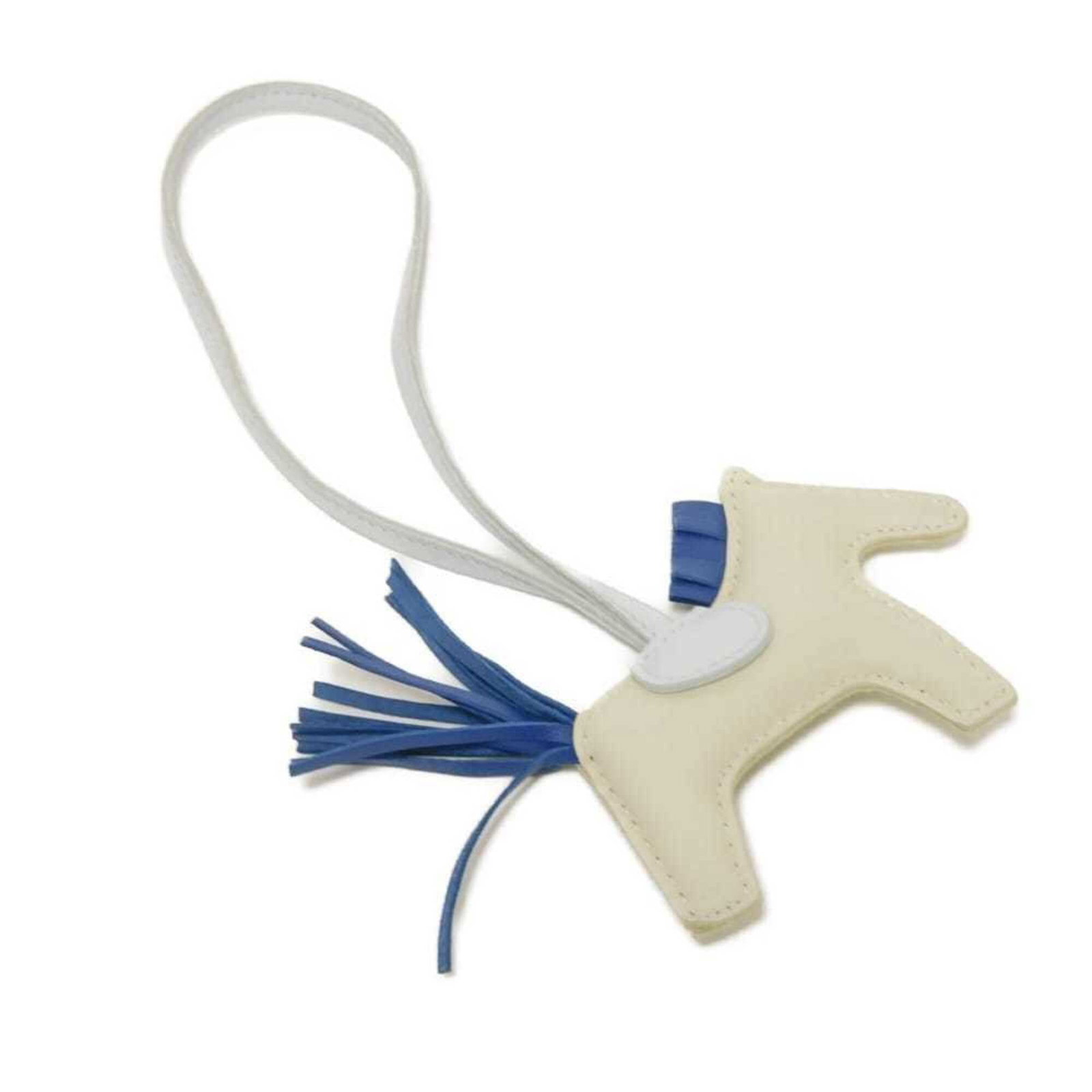 HERMES Handbag Charm Agneau Milo: HERMES Handbag Charm Agneau Milo Agneau Milo, a signature material from Herm?s, is used to create this unique handbag charm. The blue and white design showcases the distinctive texture of Agneau Milo,