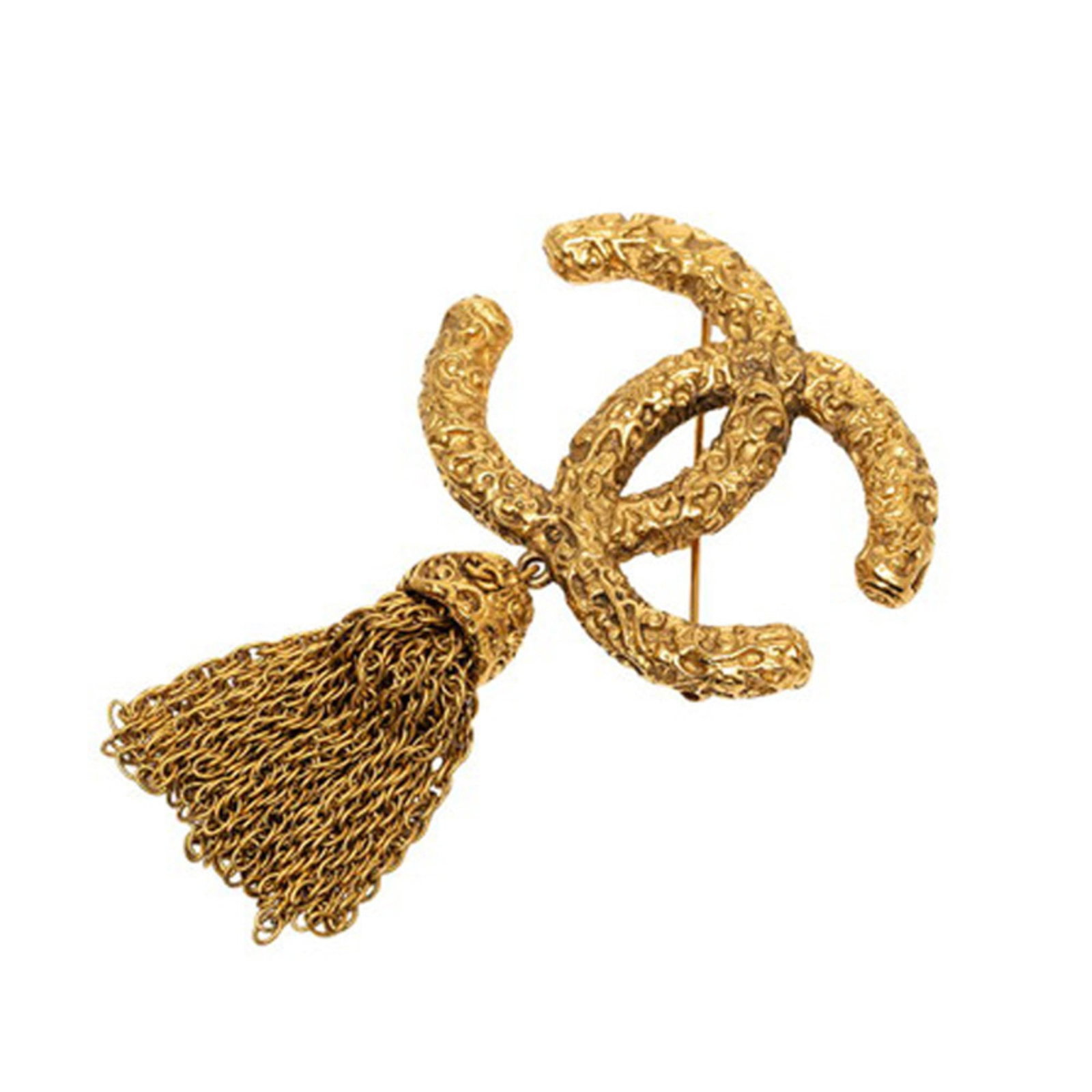 CHANEL Brooch Gold: CHANEL Brooch Gold Gold Brooch from CHANEL, measuring 8.25cm x 5.33cm, bears visible scratches and scuffs, but remains fully functional. This 3.25'' x 2.10'' brooch is made of gold and features a