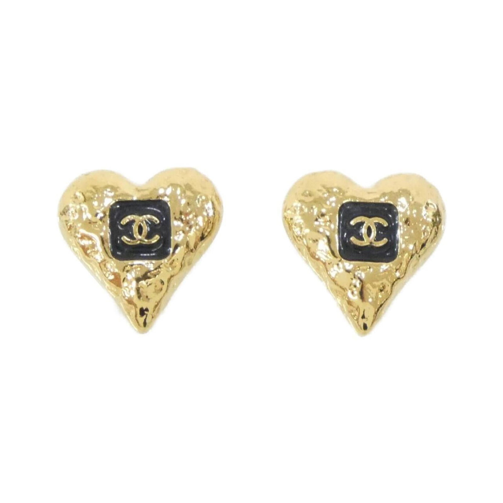 CHANEL Stud Earrings Black Gold: CHANEL Stud Earrings Black Gold Black Gold Stud Earrings from Chanel, featuring a sleek and sophisticated design. Gently used with minor signs of wear, these earrings showcase a subtle touch of