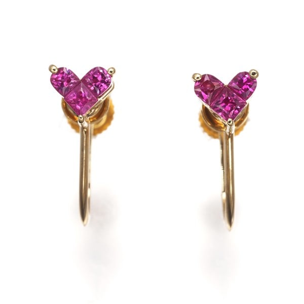 Ruby 0.20Ct/0.20Ct Heart Earrings 18K 750 Yellow Gold: Ruby 0.20Ct/0.20Ct Heart Earrings 18K 750 Yellow Gold The 18K yellow gold heart earrings showcase two natural rubies, each weighing 0.20ct, suspended from a delicate clip-on design. The 4.7 x 5.2mm ru