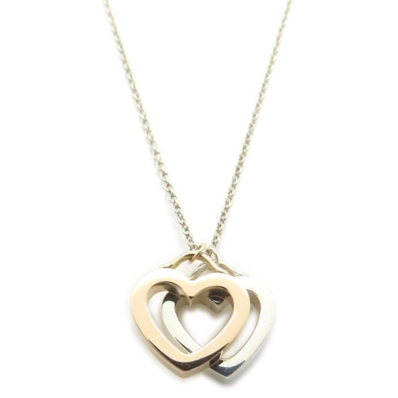 TIFFANY Pink Gold (18K) Silver 925: TIFFANY Pink Gold (18K) Silver 925 Pink gold (18K) and silver 925 come together in this elegant Tiffany necklace, featuring a 12.6mm x 10.9mm pendant. The 40.5 cm neck circumference is adjustable, mak
