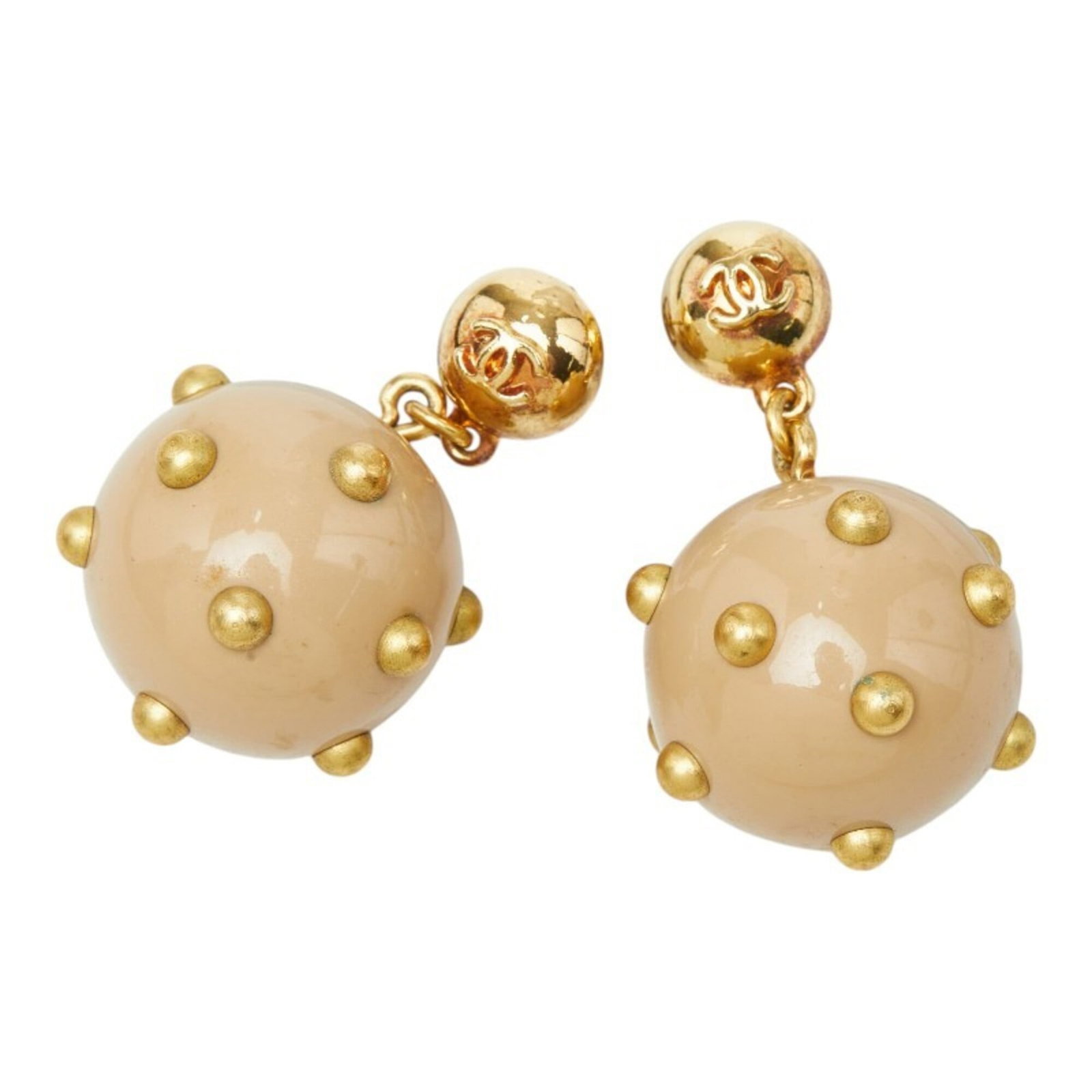 CHANEL Stud Earrings Plastic: CHANEL Stud Earrings Plastic Stud earrings in beige and gold, featuring a classic Chanel design, are available in good used condition with visible wear. Scratches and scuffs are present, but the item 