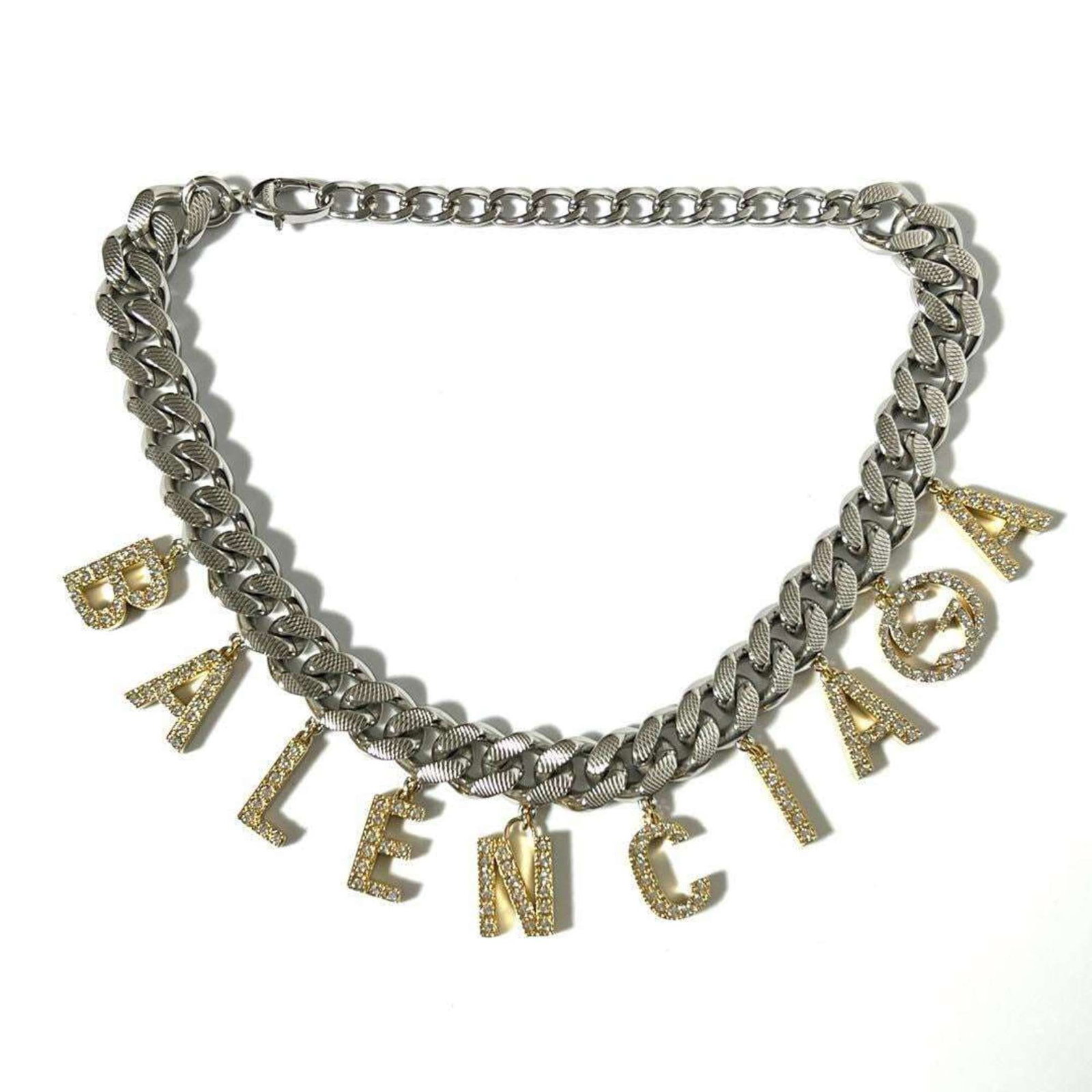 GUCCI Metal Rhinestone: GUCCI Metal Rhinestone Gucci Metal Rhinestone Pendant, a statement piece featuring intricate metalwork and sparkling rhinestones, is available for purchase. This gently used choker pendant boasts a
