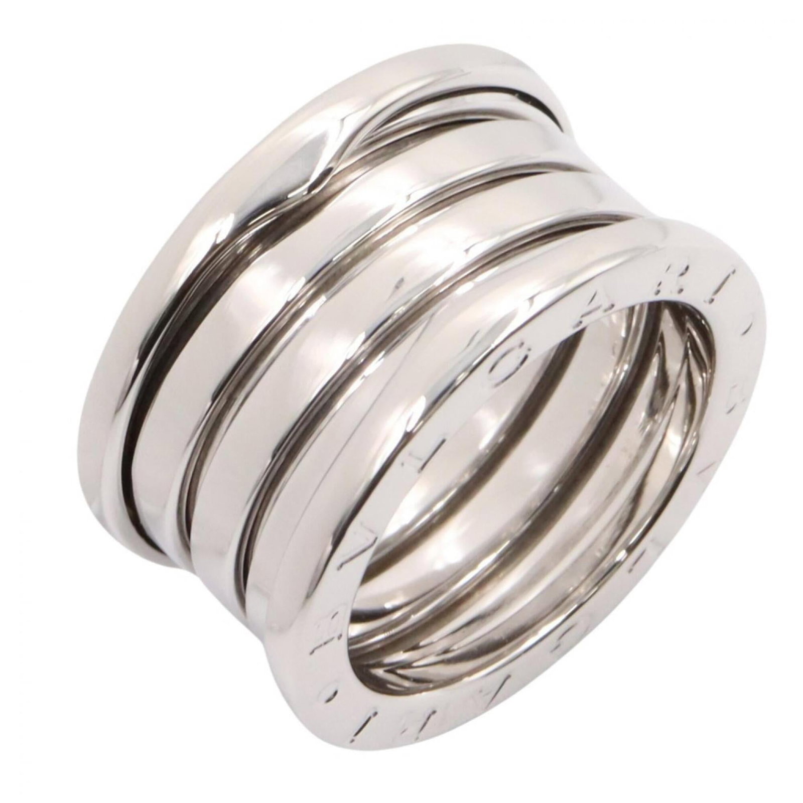 BVLGARI Band Ring White Gold (18K): BVLGARI Band Ring White Gold (18K) Bvlgari Band Ring White Gold (18K) is a sleek and sophisticated piece. Made from 18K white gold, this band ring boasts a timeless design that complements any style. 