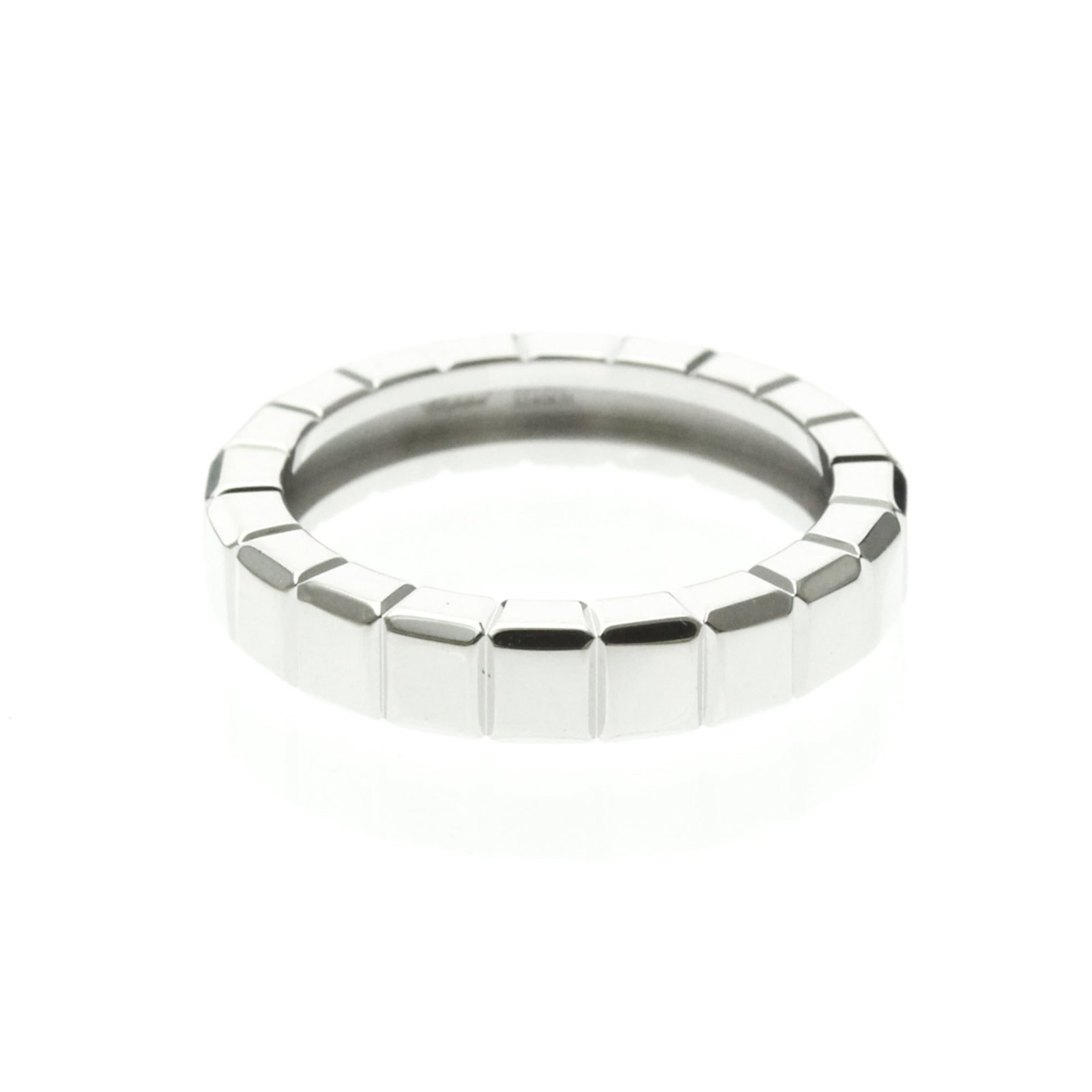 CHOPARD Band Ring White Gold (18K): CHOPARD Band Ring White Gold (18K) Chopard's Ice Cube Ring 827407 is a sleek and modern band ring crafted from 18K white gold. With a slender 4.5mm width and a US size of 7.5, this ring makes a
