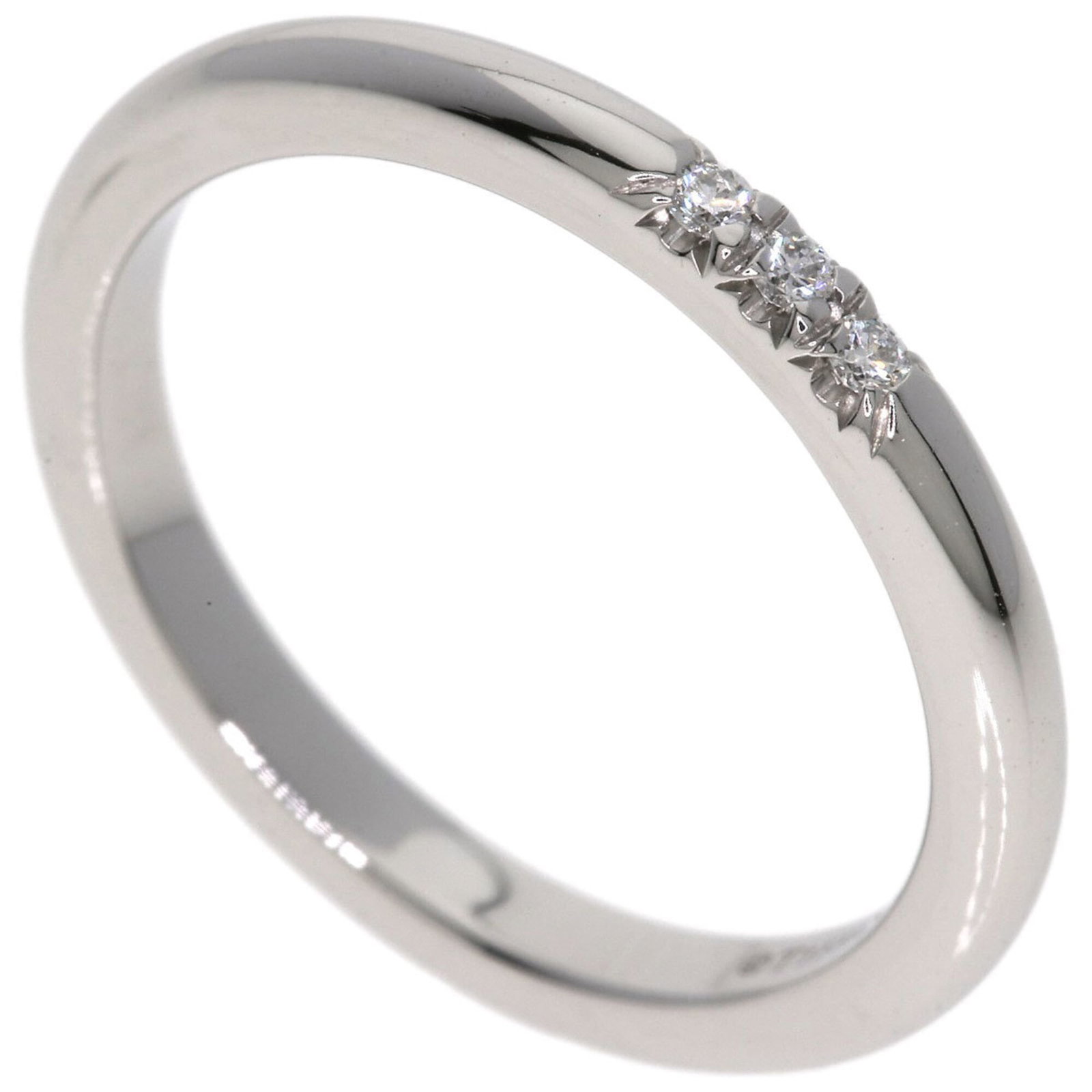 TIFFANY Band Ring Platinum 950: TIFFANY Band Ring Platinum 950 Platinum 950 Tiffany band ring in excellent condition, with a subtle sheen and a delicate design that showcases the luxury of high-end jewelry. Gently used, this ring fe