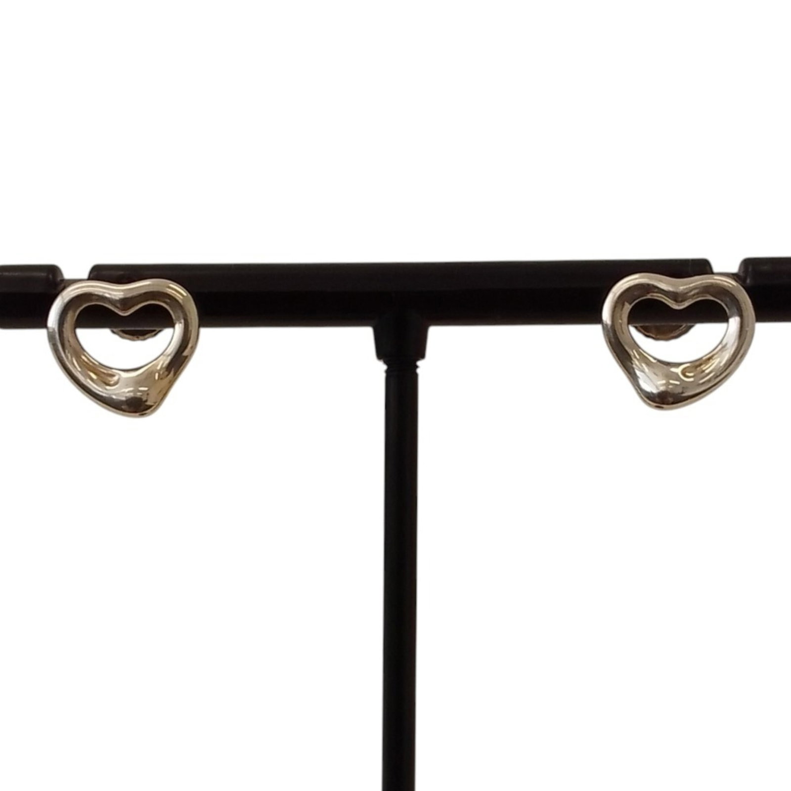 TIFFANY Stud Earrings Silver 925: TIFFANY Stud Earrings Silver 925 Silver 925 stud earrings from Tiffany's Open Heart line, featuring a classic design with a subtle touch of elegance. Gently used with minor signs of wear, these earrin