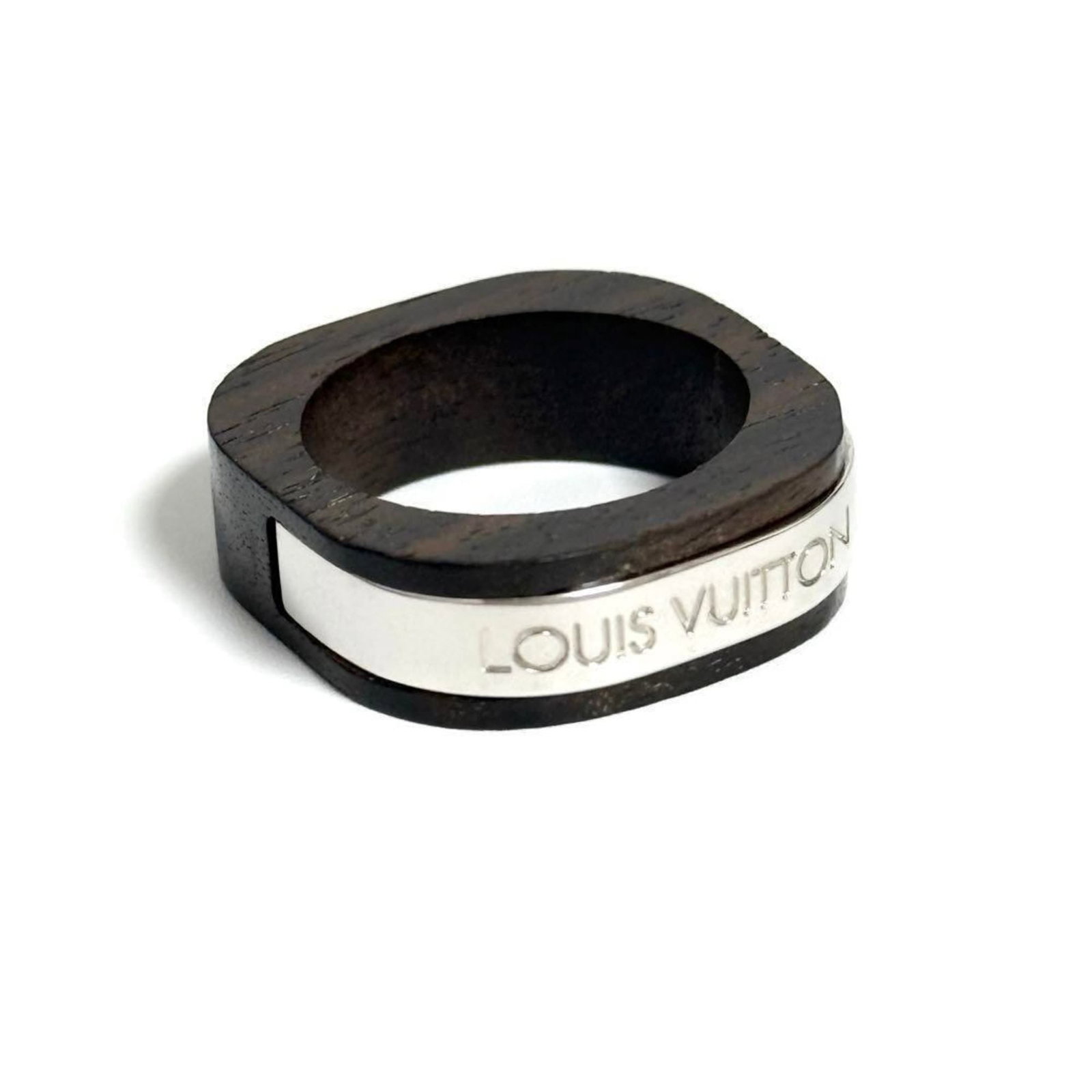 LOUIS VUITTON Band Ring Metal Wood: LOUIS VUITTON Band Ring Metal Wood Metal and wood come together in this unique Louis Vuitton band ring, featuring a distinctive blend of materials. The ring boasts a metal and wood design, with a US s