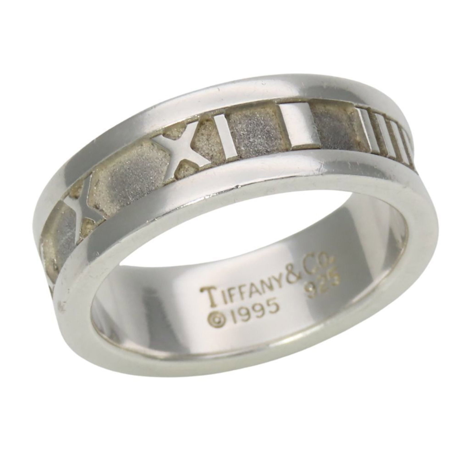 TIFFANY Band Ring Silver 925: TIFFANY Band Ring Silver 925 Silver 925 band ring from Tiffany's Atlas line, featuring a 12.50mm stone and a 6.5mm width, this classic design is a timeless addition to any jewelry collection. With its