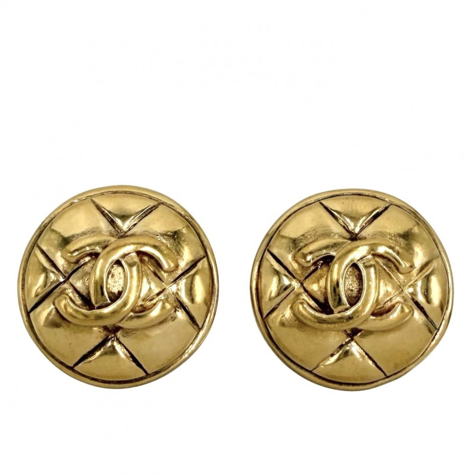CHANEL Clip Earrings Gold Plating: CHANEL Clip Earrings Gold Plating Gold plated clip earrings from CHANEL, featuring a sleek and modern design. The item bears visible wear, including scratches and scuffs, but remains fully functional.