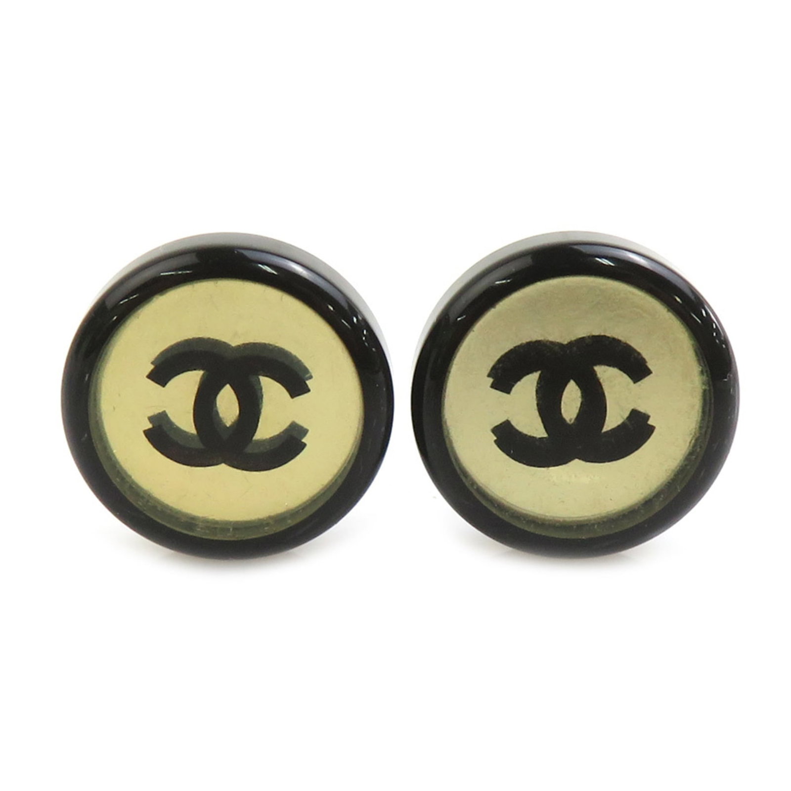 CHANEL Clip Earrings Metal Plastic: CHANEL Clip Earrings Metal Plastic Metal and plastic construction gives these CHANEL Clip Earrings a sleek, modern look. Available in black and silver, they feature visible scratches and scuffs,