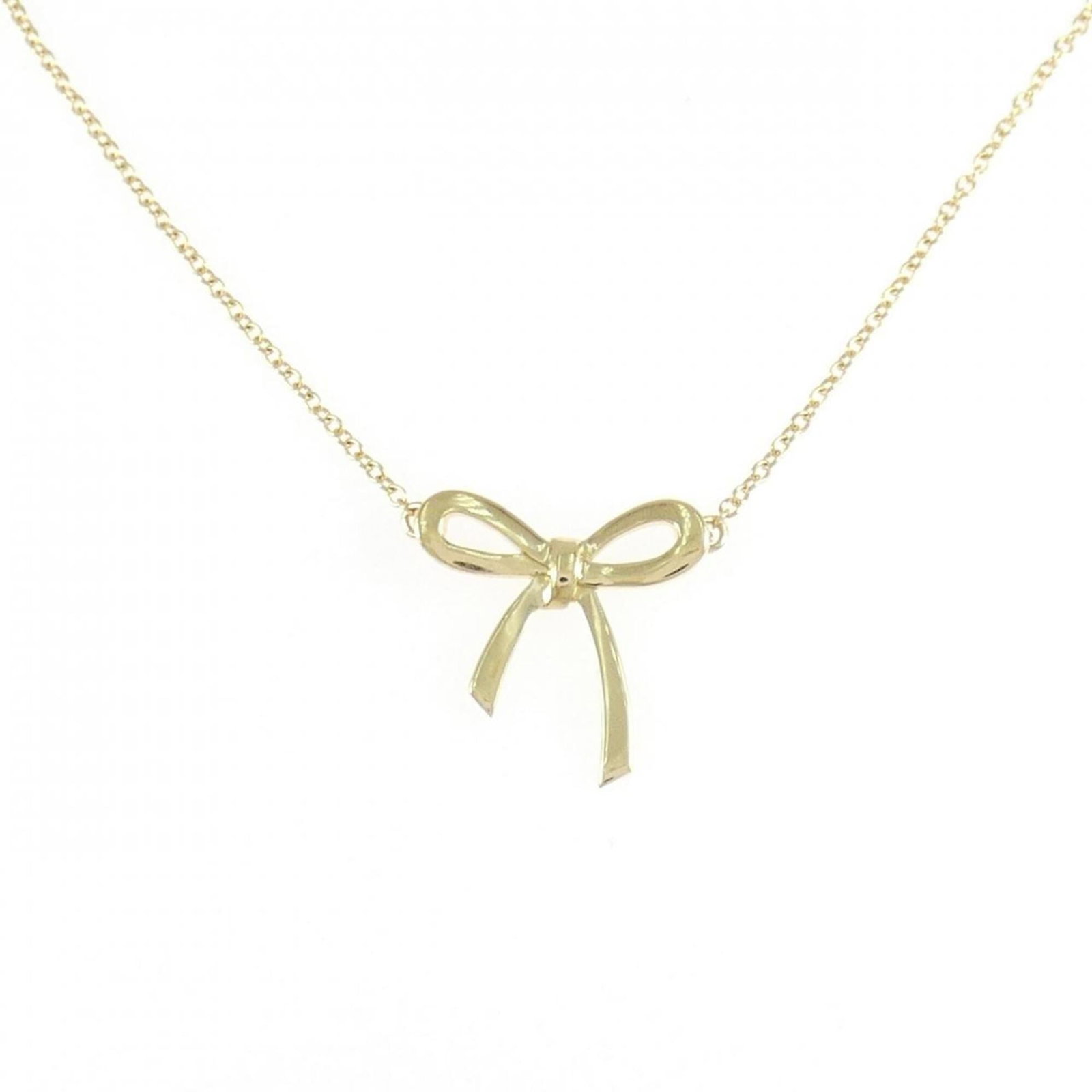TIFFANY Yellow Gold (18K): TIFFANY Yellow Gold (18K) Yellow gold (18K) pendant from Tiffany, featuring a delicate design with a 14.7mm x 15mm size. The necklace type is pendant, and it is a very good condition gently used item 