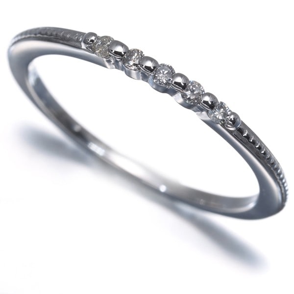 Agete Ring Diamond 0.05Ct 5P Us5 18K 750 White Gold: Agete Ring Diamond 0.05Ct 5P Us5 18K 750 White Gold 18k white gold ring features a 0.05ct diamond, a small yet elegant touch. The ring's slender design, with a 1.4mm wide band and 1.1mm shank, adds to