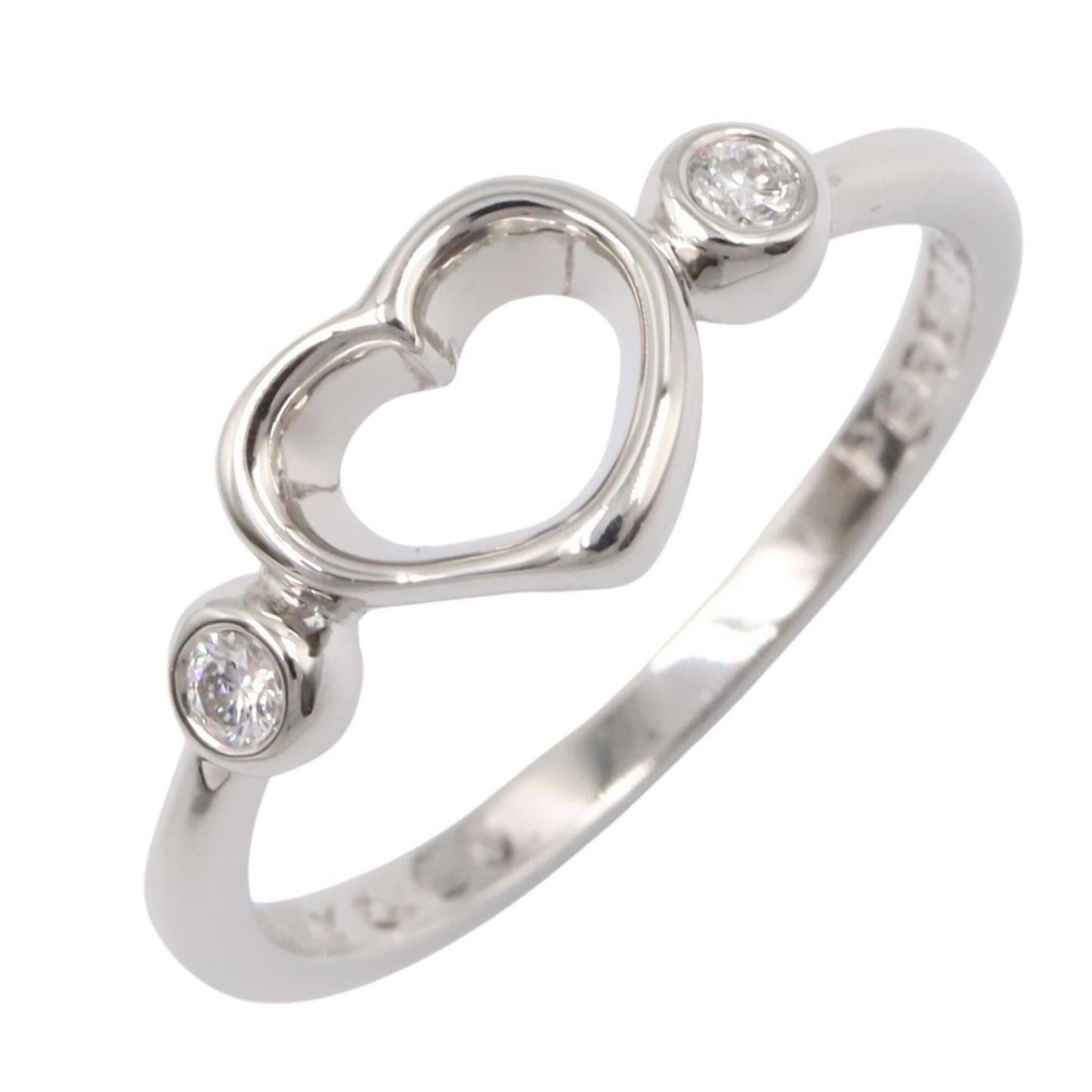 TIFFANY Band Ring Platinum 950: TIFFANY Band Ring Platinum 950 Platinum 950 Tiffany band ring with a clear diamond stone, available in a US size 6. This gently used ring features minor signs of wear, including small scratches or lig