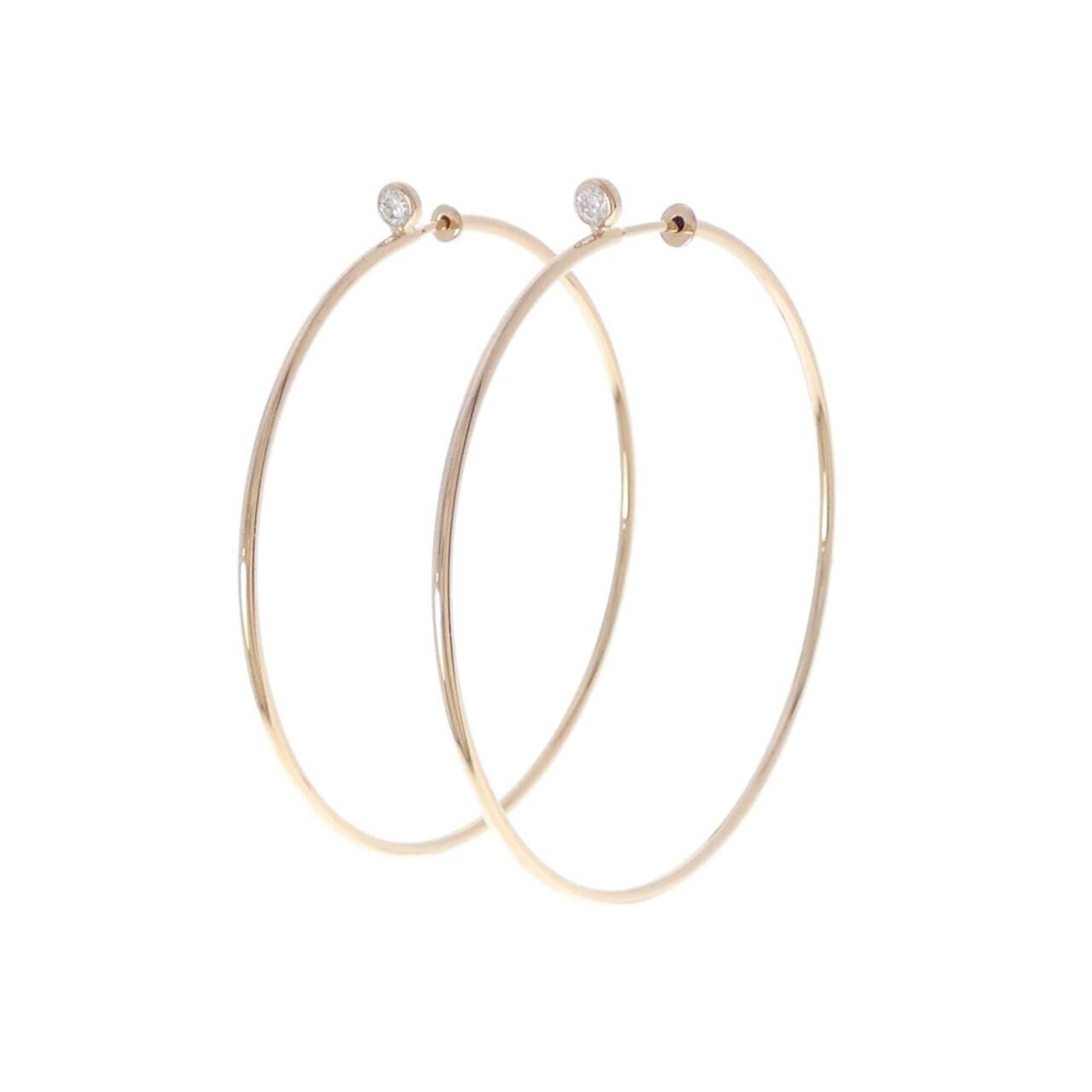 TIFFANY Hoop Earrings Pink Gold (18K): TIFFANY Hoop Earrings Pink Gold (18K) Pink gold (18K) hoop earrings with a subtle shine, featuring a delicate 43.60mm diameter and 2.90mm width. Made from high-quality pink gold, these earrings exude