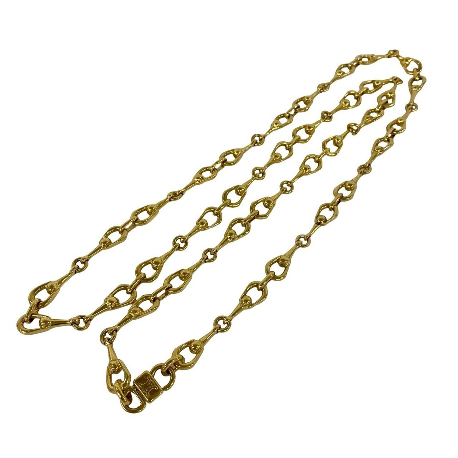 CELINE Gold Plating: CELINE Gold Plating Gold plating gives this Celine necklace a luxurious touch, adding a subtle shine to its overall design. The necklace features a gold plating material and a gold color, with a neck