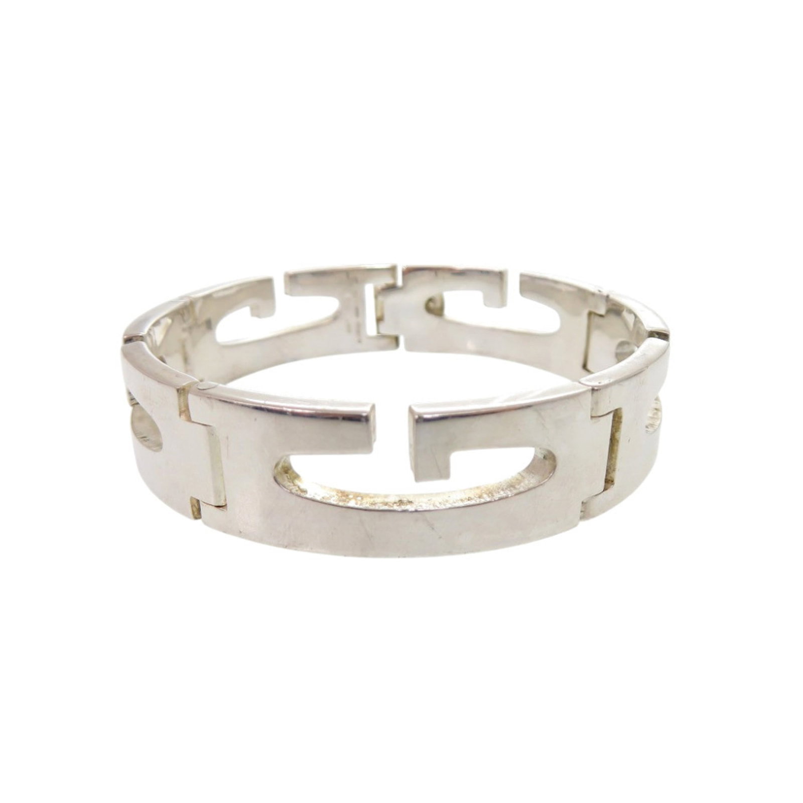 GUCCI Bangle Silver 925: GUCCI Bangle Silver 925 Silver 925 bangle from Gucci, Italy, featuring a classic design with visible scratches and scuffs. The item measures 18.5cm in length and is made from high-quality silver.