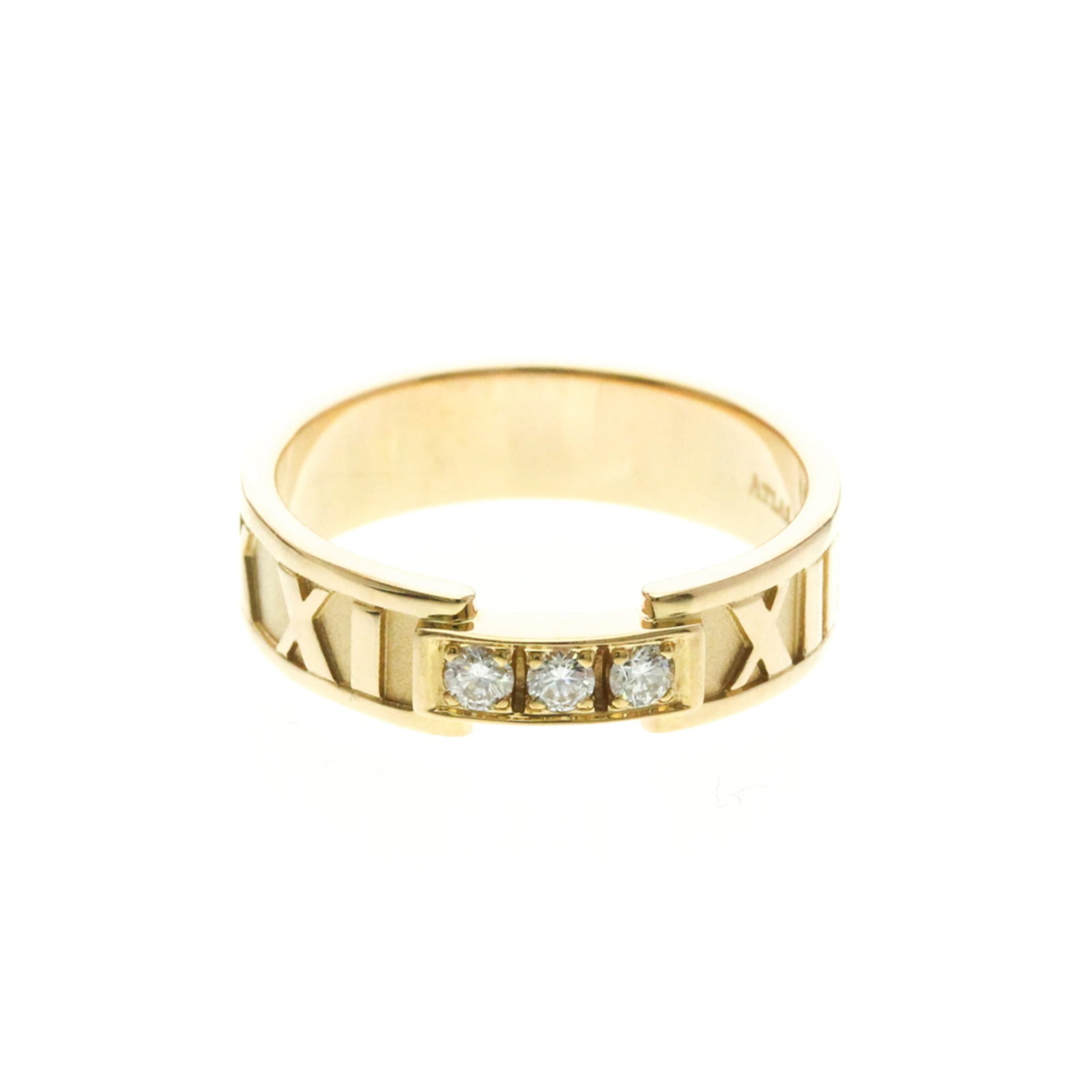 TIFFANY Band Ring Pink Gold (18K): TIFFANY Band Ring Pink Gold (18K) Pink gold (18K) band ring with a diamond, featuring a 5.3mm wide and 5.3g weight design. This gently used band showcases a subtle pink hue and minor signs of wear, wi