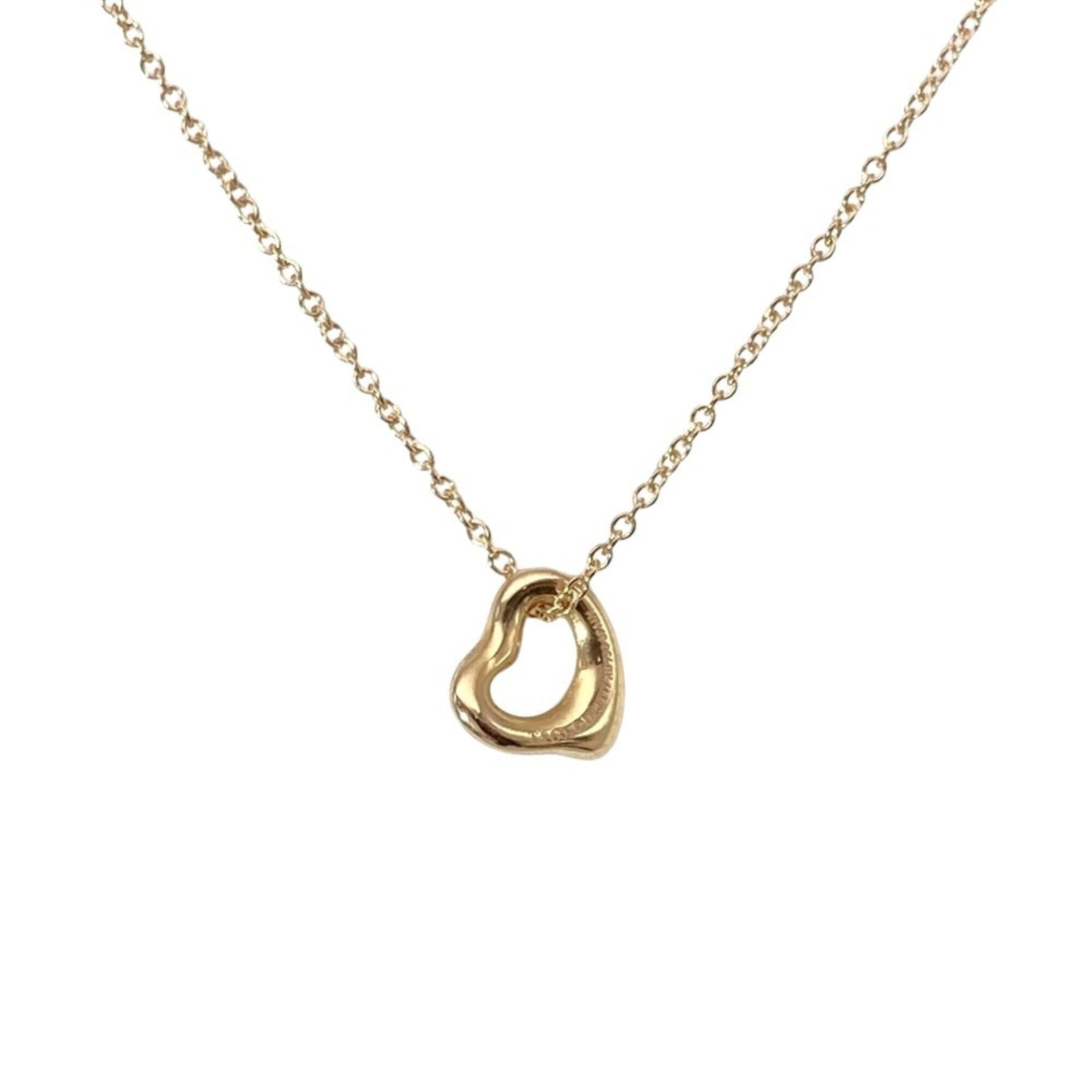 TIFFANY Pink Gold (18K): TIFFANY Pink Gold (18K) Pink gold (18K) Tiffany Necklace with Visible Wear. This 40.3 cm necklace features a 7mm x 7mm pendant made from 18K pink gold, bearing visible scratches, scuffs, and dirt. In