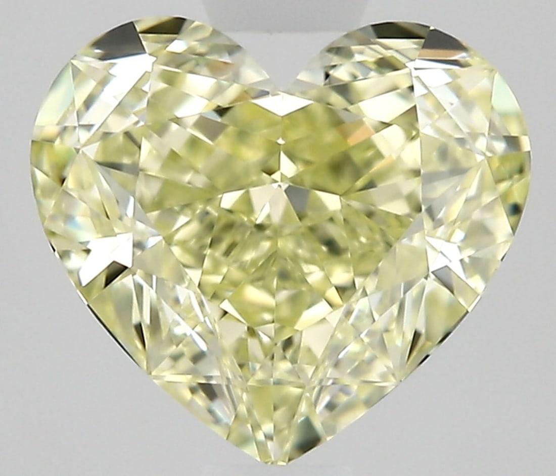 GIA Heart 1.28ct Fancy Light Yellow VVS1 - Loose Natural Diamond: GIA Heart 1.28ct Fancy Light Yellow VVS1 - Loose Natural Diamond GIA-certified, this 1.28ct Fancy Light Yellow VVS1 diamond boasts exceptional clarity and color. Its natural beauty shines through