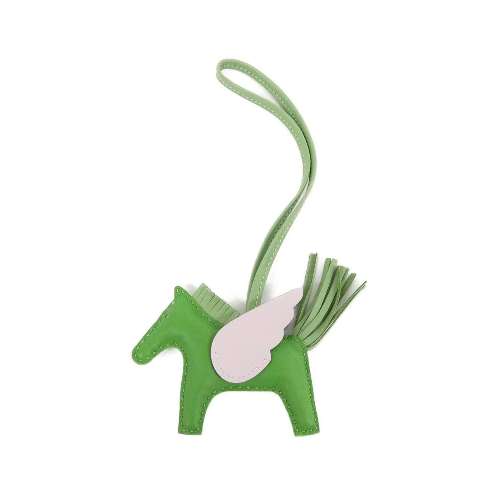 HERMES Handbag Charm Vert: HERMES Handbag Charm Vert The Hermes Handbag Charm Vert is a unique and stylish accessory, featuring a vibrant green color that adds a pop of personality to any outfit. This gently used charm