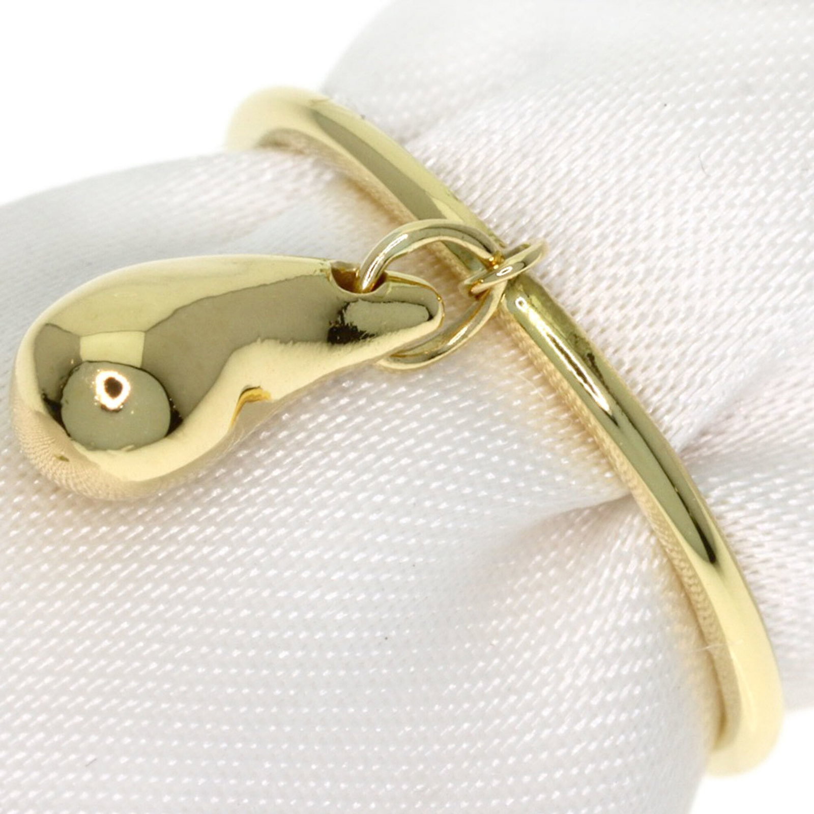 TIFFANY Band Ring Yellow: TIFFANY Band Ring Yellow Yellow Tiffany Band Ring in 18K Gold. This 18K gold band ring features a bright yellow metal tone and a slim 1.1mm width, making it a stylish and elegant accessory. With its g