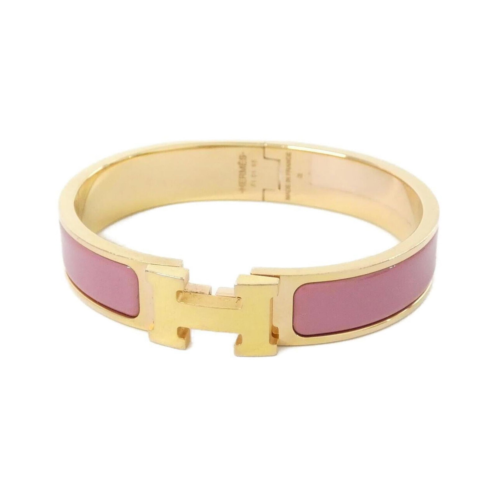 HERMES Charm Bracelet Pink Rose Gold: HERMES Charm Bracelet Pink Rose Gold Pink Rose Gold Charm Bracelet from Hermes. This gently used charm bracelet features a pink rose gold finish and measures 16cm in length. With minor signs of wear,