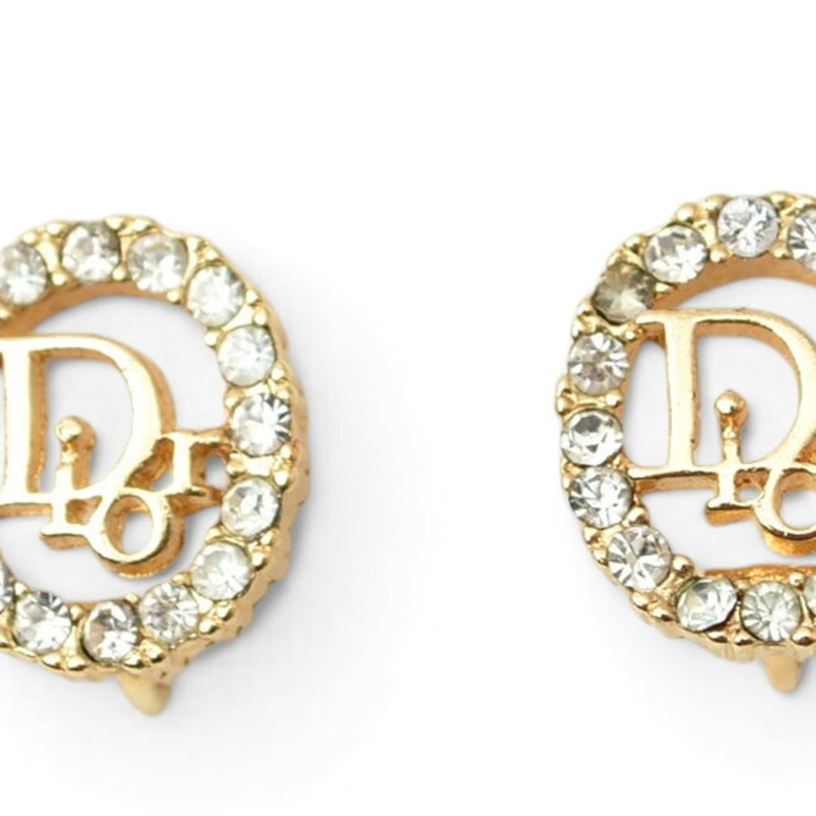 CHRISTIAN DIOR Rhinestone: CHRISTIAN DIOR Rhinestone Gently used Christian Dior rhinestone pendant in gold, featuring a 13.00mm x 15.00mm stone size. The item bears minor signs of wear, including small scratches or light marks,