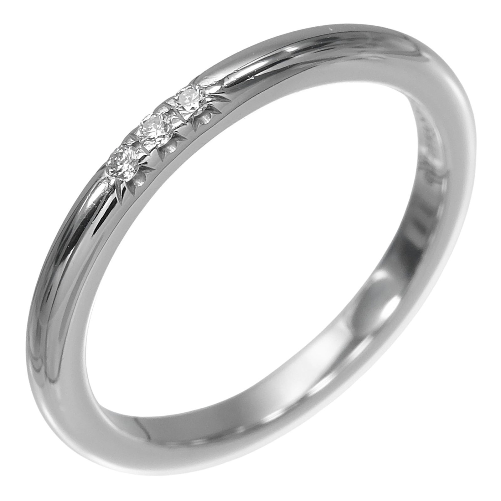 TIFFANY Band Ring Platinum 950: TIFFANY Band Ring Platinum 950 Platinum 950 Tiffany Band Ring with Diamond Stone. Gently used, this band ring features a diamond stone set in platinum, with a US size 4 fit. Minor signs of wear are