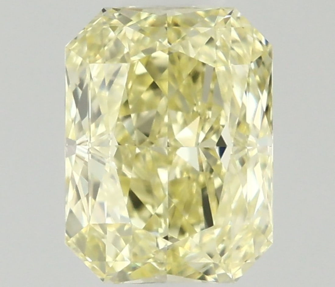 Radiant 0.4ct Fancy Light Yellow VVS1 - Loose Natural Diamond: Radiant 0.4ct Fancy Light Yellow VVS1 - Loose Natural Diamond 0.4ct Fancy Light Yellow VVS1 - Loose Natural DiamondThe 0.4ct Fancy Light Yellow VVS1 diamond boasts exceptional clarity and color, with