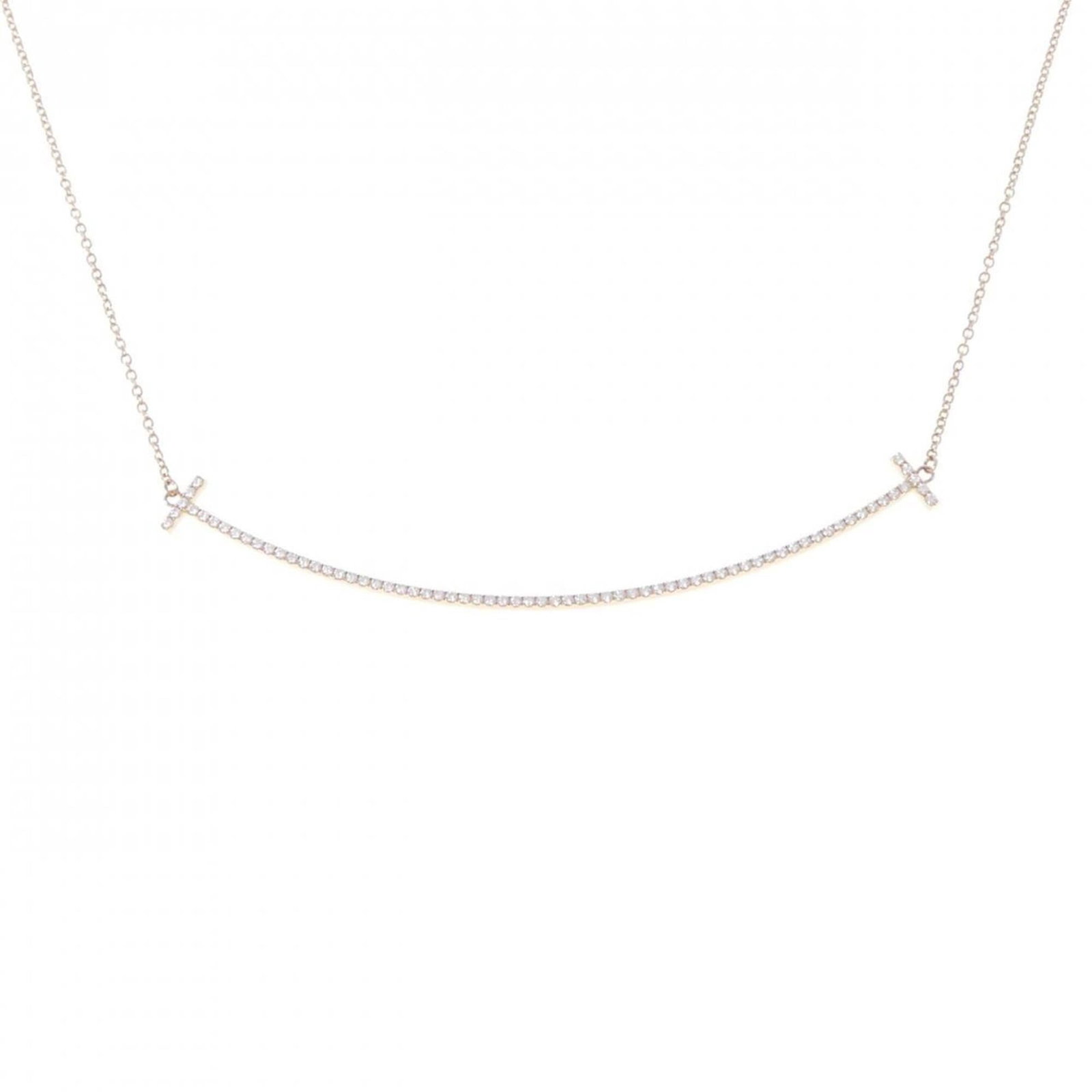 TIFFANY Pink Gold (18K): TIFFANY Pink Gold (18K) Pink gold (18K) pendant necklace from Tiffany, featuring a 6mm x 68.9mm pendant suspended from a chain that fits 41 cm - 45 cm neck circumferences. This like-new used necklace 