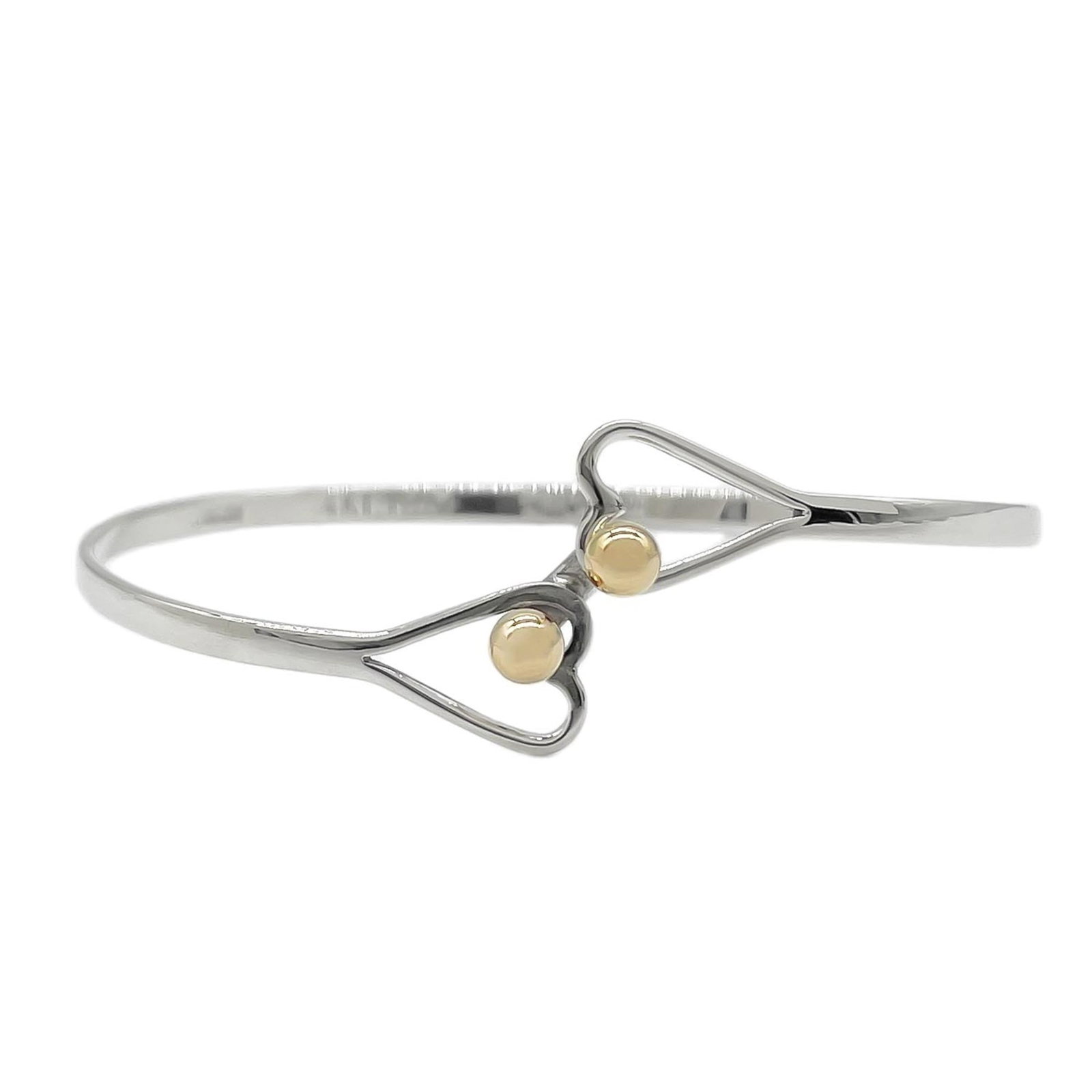 TIFFANY Charm Bracelet Sterling Silver 925: TIFFANY Charm Bracelet Sterling Silver 925 Sterling silver 925 charm bracelet from Tiffany, featuring a delicate design with minor signs of wear. The bracelet measures 14cm in length and is made from 