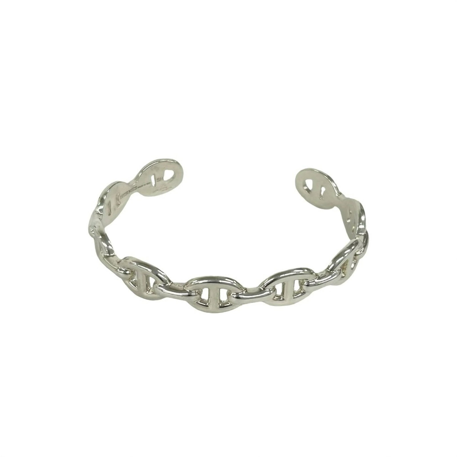 HERMES Bangle Silver 925: HERMES Bangle Silver 925 Silver 925 bangle from Hermes, featuring a classic design with visible scratches and scuffs from previous use. The bangle measures 16.5cm in length and is made from high-quali