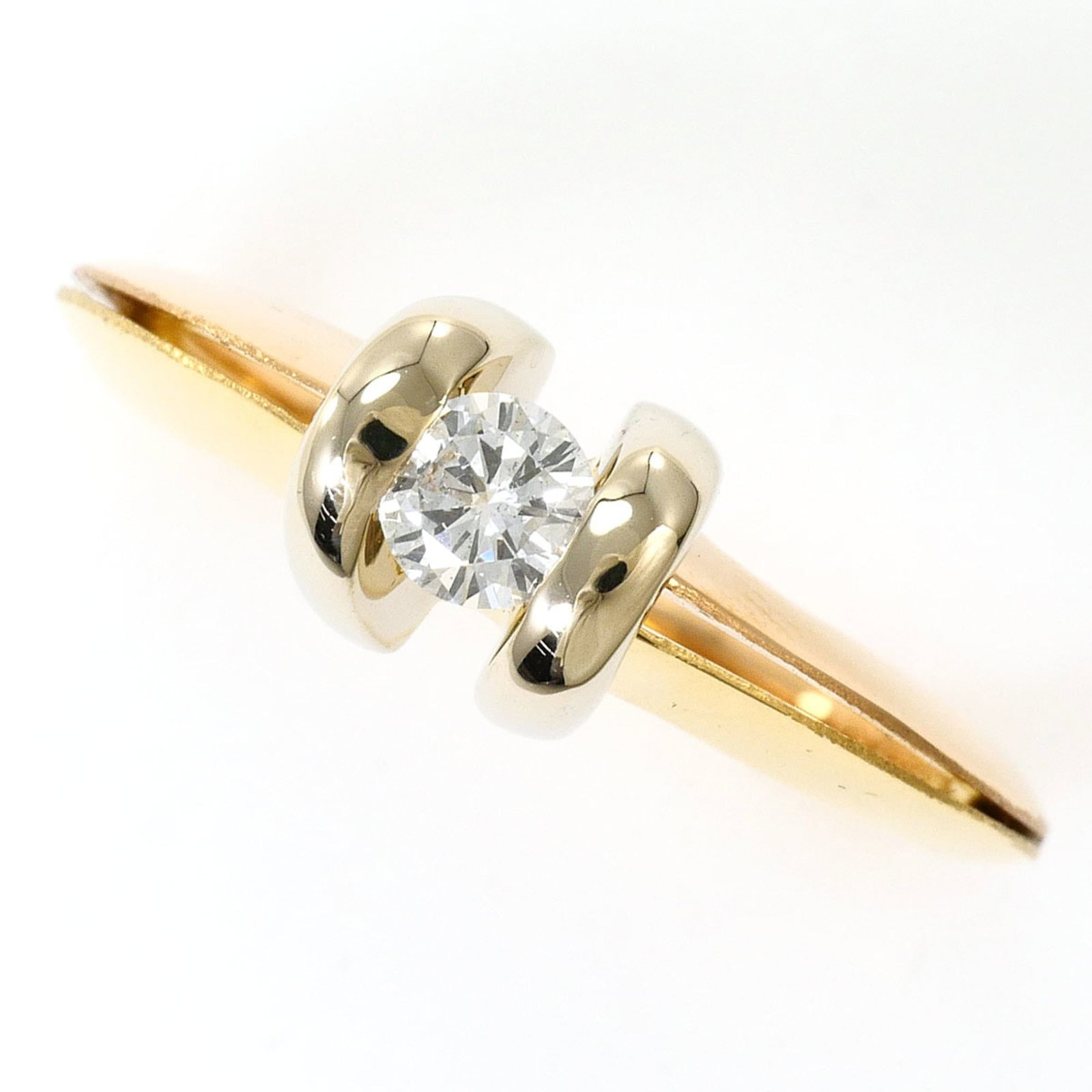 Band Ring Pink Gold (18K) White Gold (18K) Yellow Gold (18K): Band Ring Pink Gold (18K) White Gold (18K) Yellow Gold (18K) Pink gold, White gold, Yellow gold 18K band ring with a diamond stone, available in US size 6 and 6mm width, weighing 4.2g. This like new