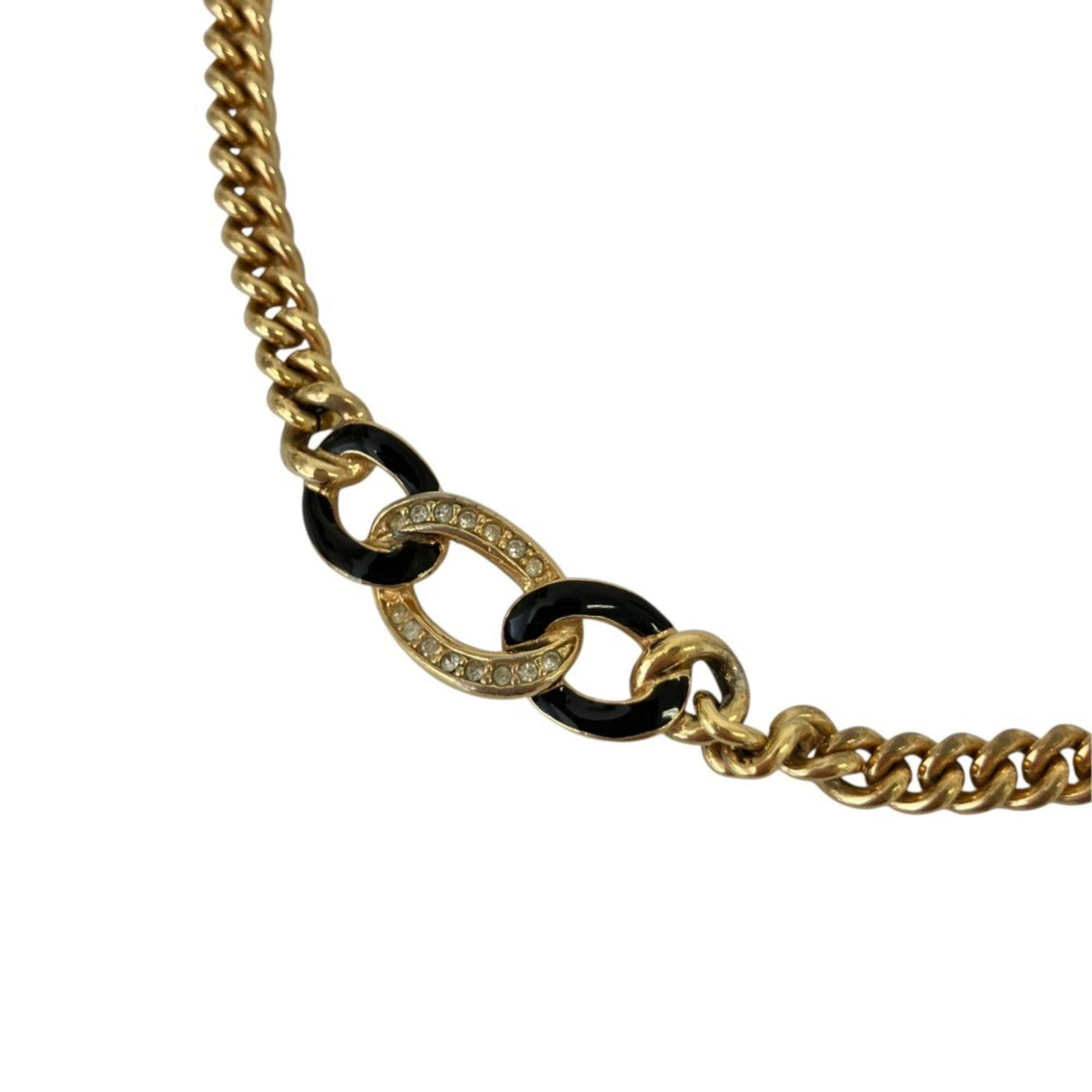 CHRISTIAN DIOR Gold: CHRISTIAN DIOR Gold Gold rhinestone necklace from Christian Dior, featuring a 10mm x 30mm pendant and a 41 cm chain. The necklace is made of gold and weighs 29g, with minor signs of wear and small scr