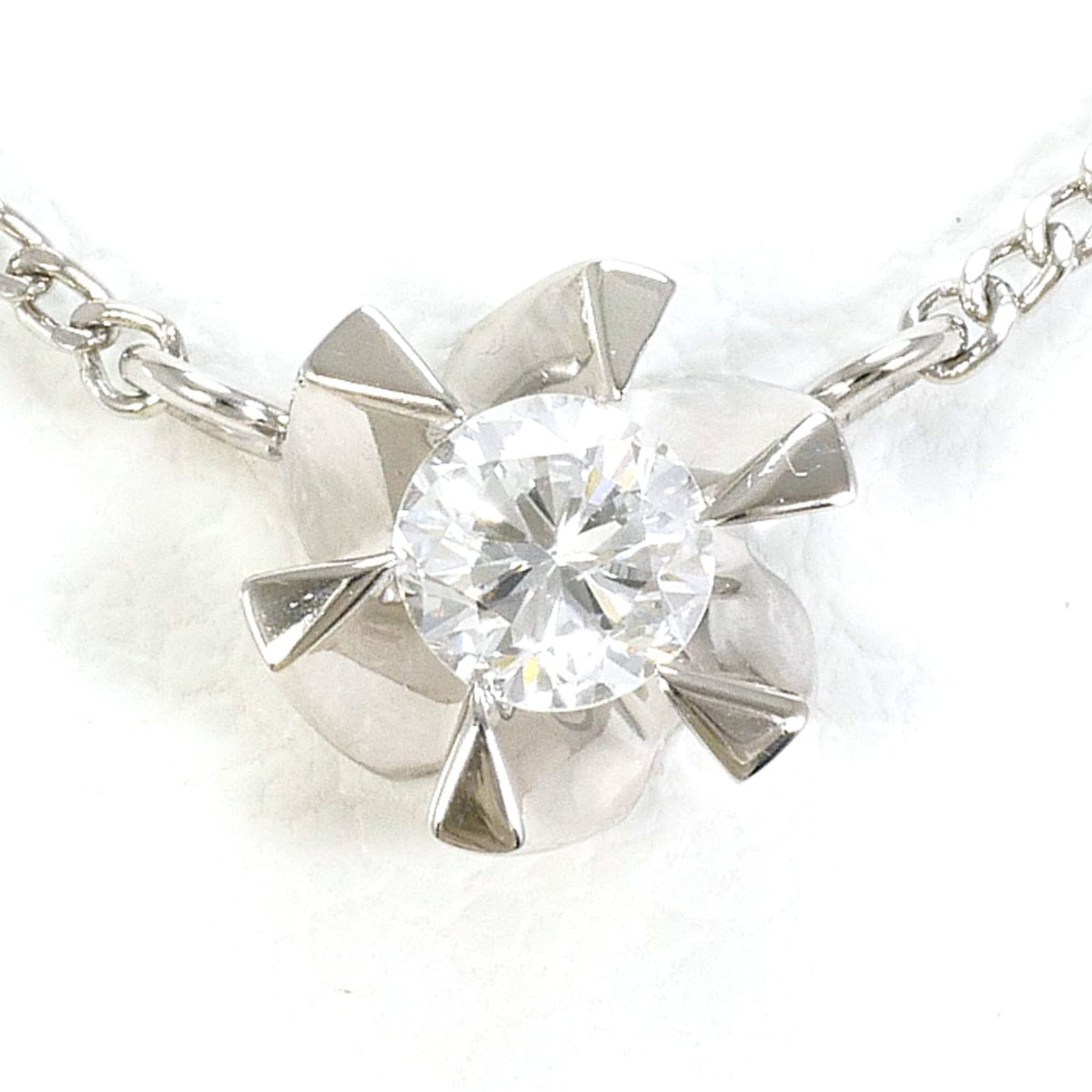 Platinum 850 Necklace: Platinum 850 Necklace Platinum 850 Necklace features a stunning 0.16 carat diamond pendant set in platinum, with a sleek 7mm x 7mm design that adds a touch of sophistication to any outfit. The necklac
