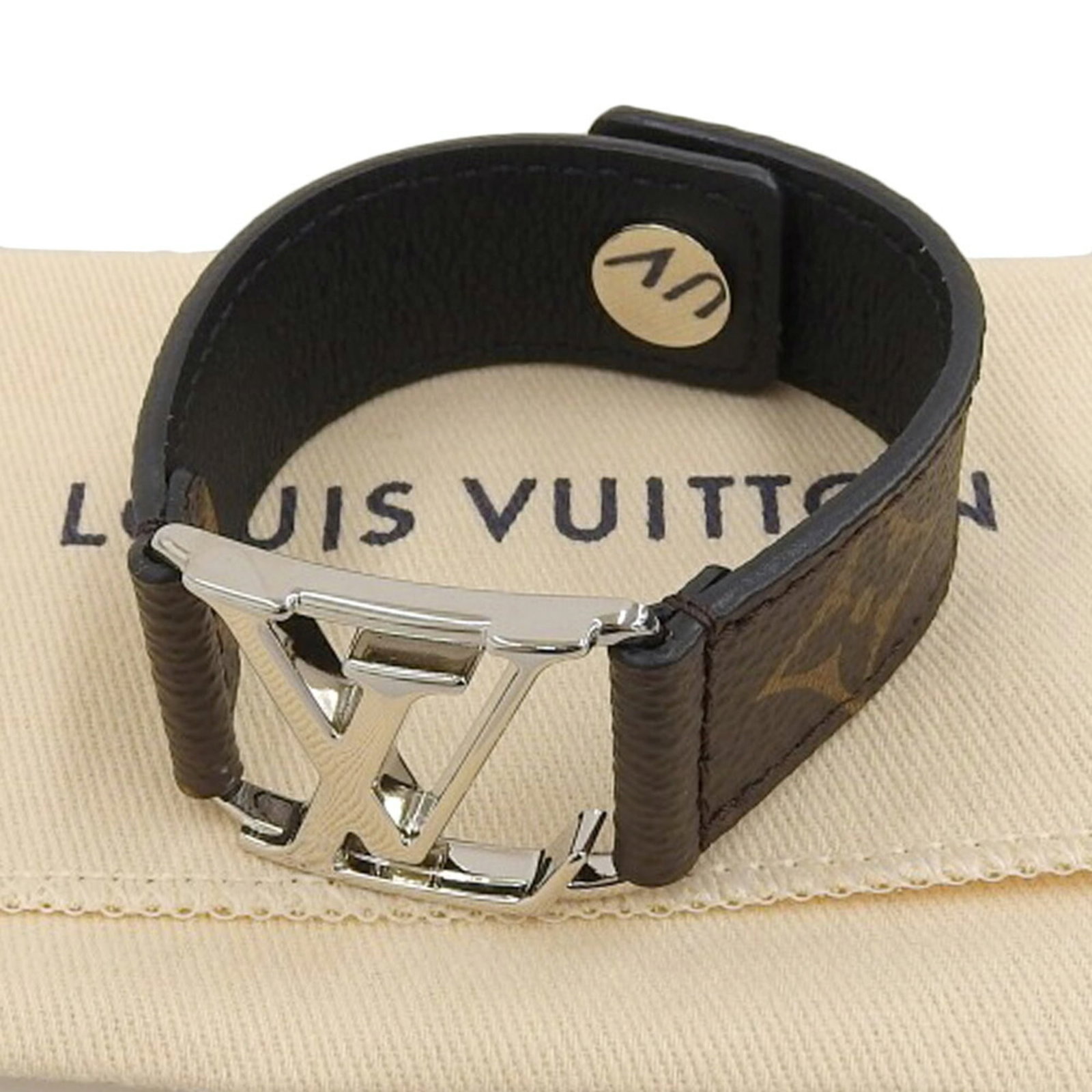 LOUIS VUITTON Charm Bracelet Metal: LOUIS VUITTON Charm Bracelet Metal The Louis Vuitton Charm Bracelet Metal is a stylish accessory featuring the iconic Monogram design. Made from high-quality metal, this charm bracelet boasts a sleek