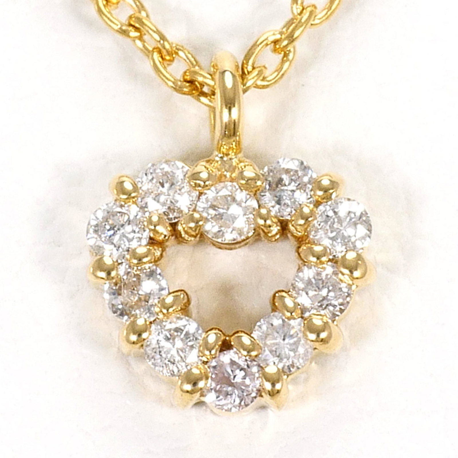 Yellow Gold (18K): Yellow Gold (18K) Yellow gold (18K) necklace with a 0.16ct diamond pendant, crafted from 18K gold for a luxurious touch. The necklace boasts a 40cm length and 7mm x 5mm pendant size, making it a