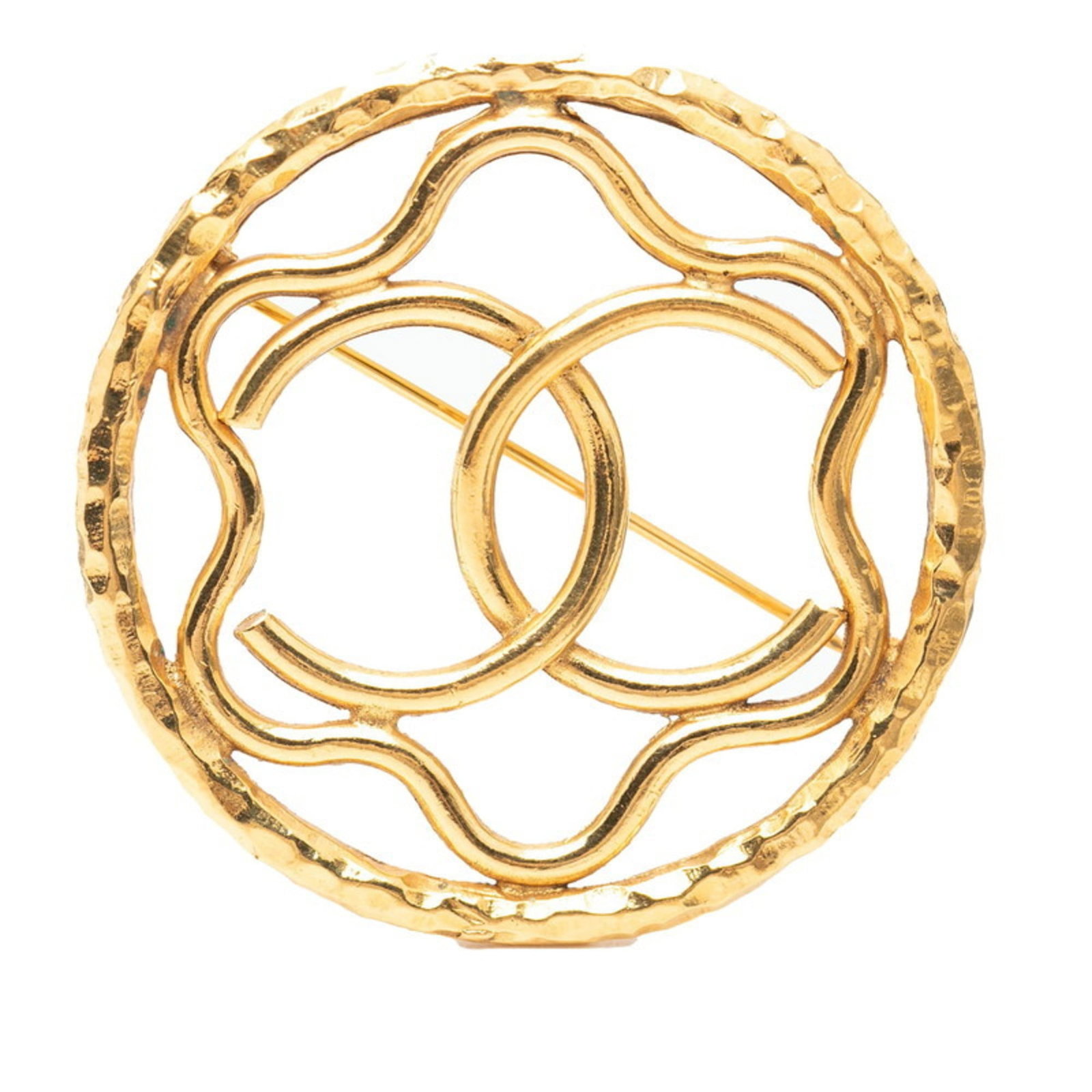 CHANEL Brooch Gold: CHANEL Brooch Gold Gold Chanel Brooch in Good Used Condition. This 4.31cm x 4.31cm gold brooch features visible scratches and scuffs, showcasing its worn and well-loved state. With its signature gold