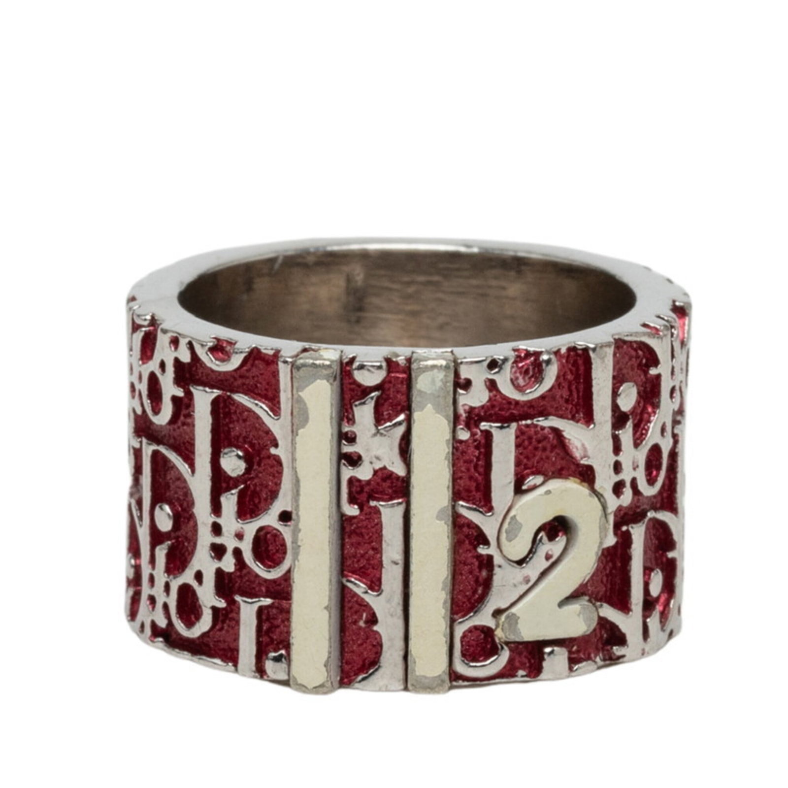 CHRISTIAN DIOR Band Ring Metal: CHRISTIAN DIOR Band Ring Metal Metal band ring from Christian Dior, featuring a classic design with visible scratches and scuffs from previous wear. This good condition used ring is made from metal