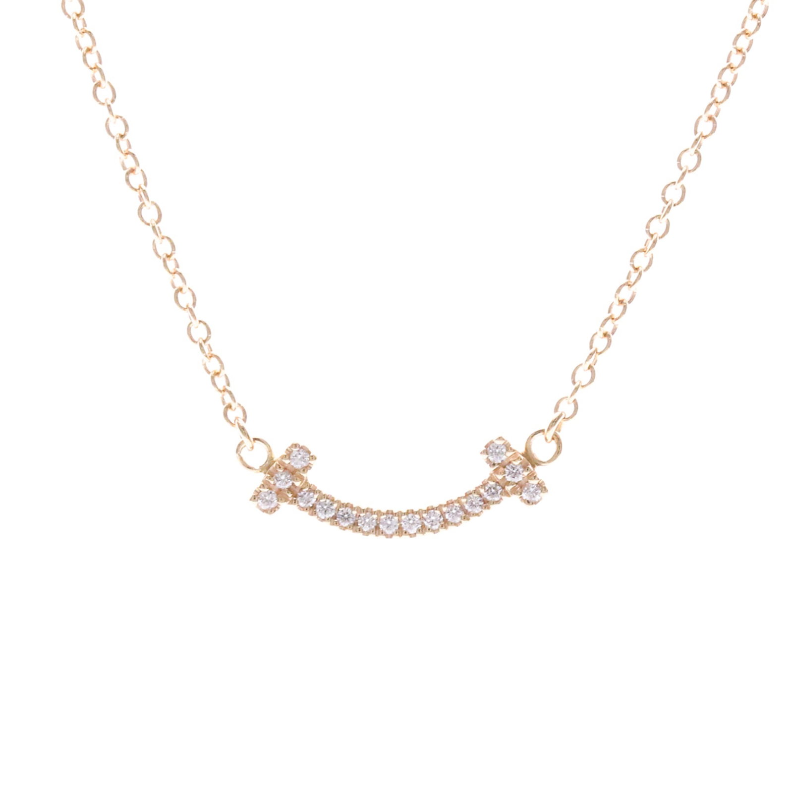 TIFFANY Pink Gold (18K): TIFFANY Pink Gold (18K) 18K Pink Gold Tiffany T Smile Small Size Necklace. This 18K pink gold necklace features a fashion design with a necklace style that is perfect for making a statement. With a