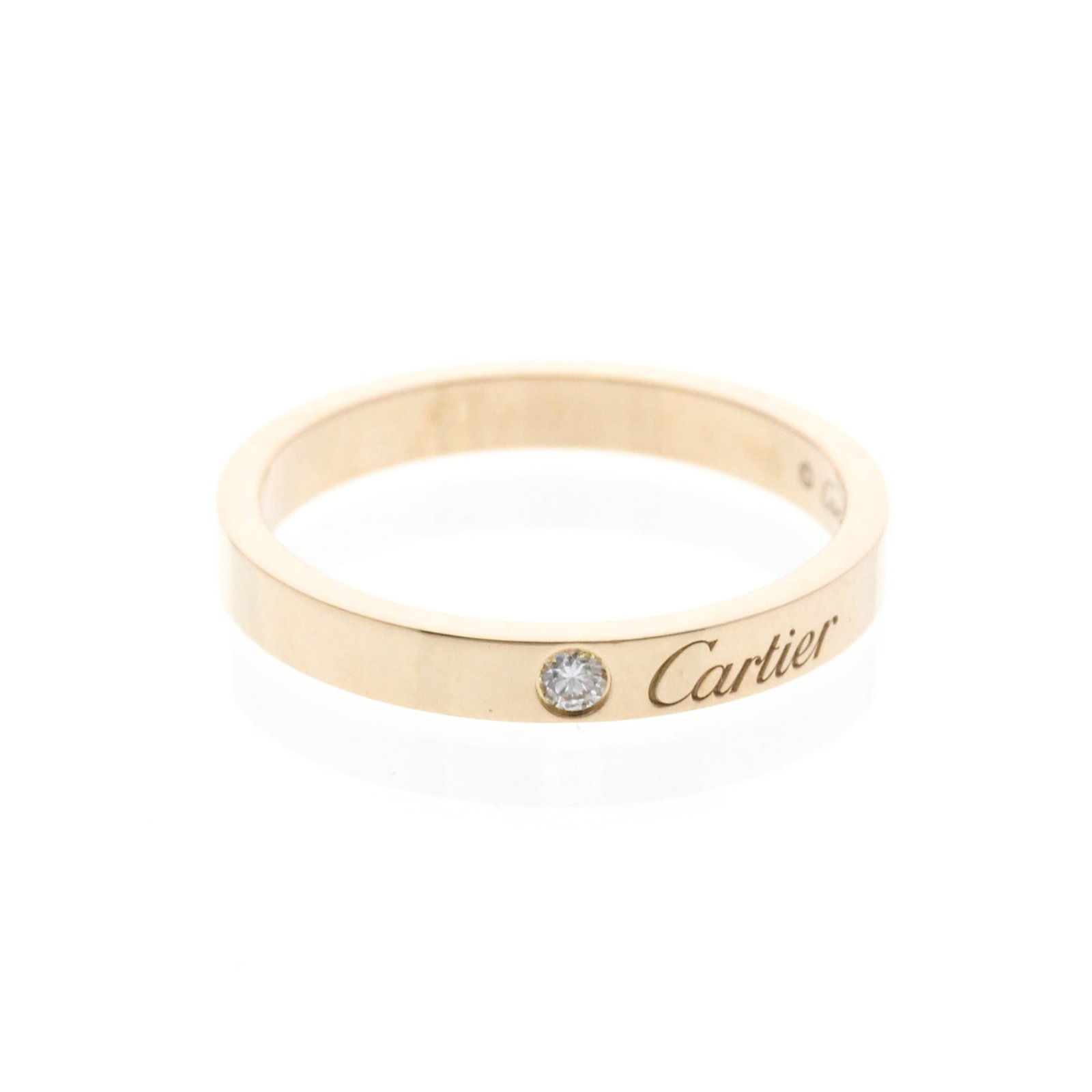 CARTIER Band Ring Pink Gold (18K): CARTIER Band Ring Pink Gold (18K) Pink gold (18K) Cartier C de Cartier Wedding Ring with a 1 diamond, this elegant band ring is a timeless piece of fashion jewelry. Measuring 9 in US size, it features