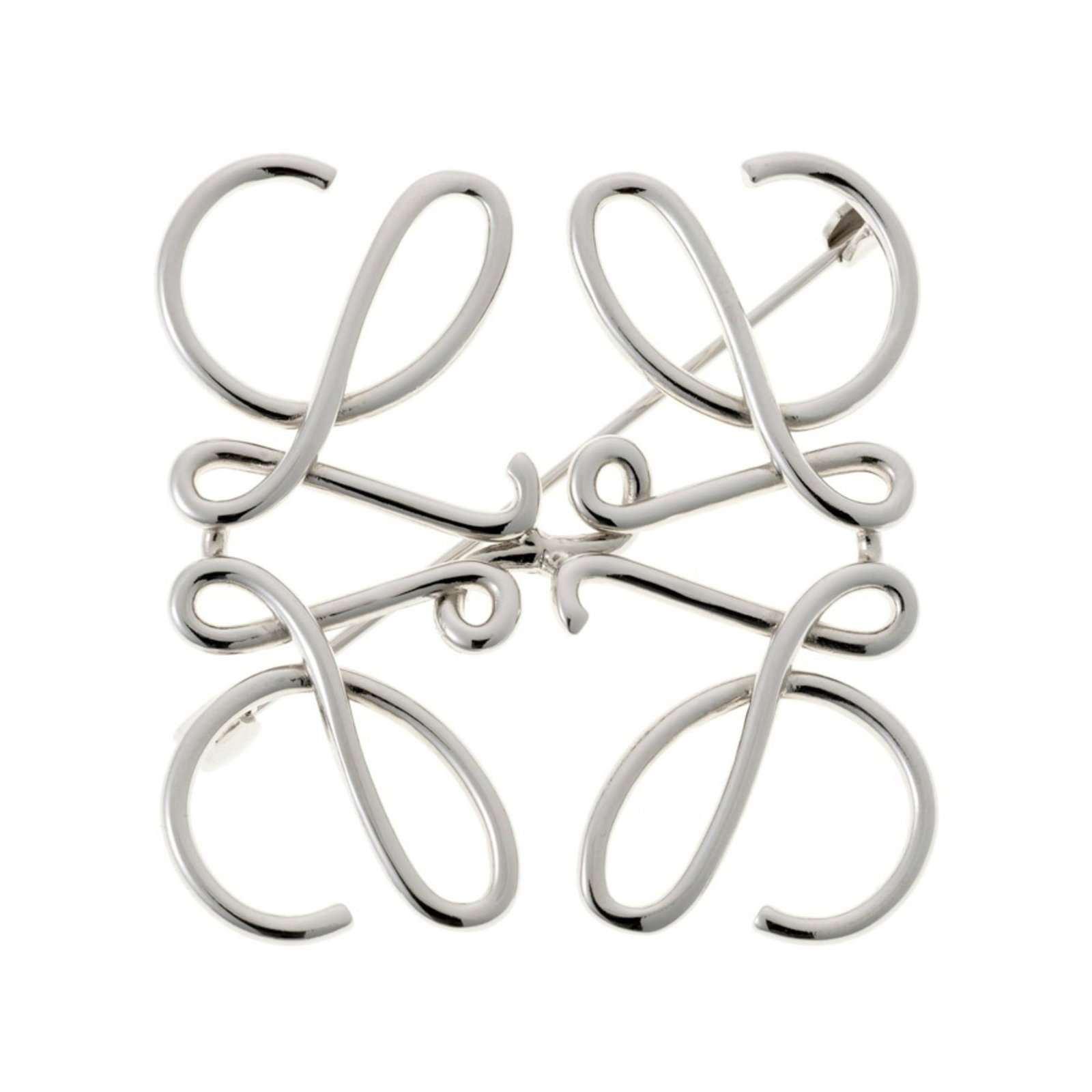 LOEWE Brooch Brass Metal: LOEWE Brooch Brass Metal Brass metal brooch from LOEWE, Spain, with a 5cm x 5.2cm x 2.00mm size. This gently used brooch features minor signs of wear, including small scratches or light marks, and is