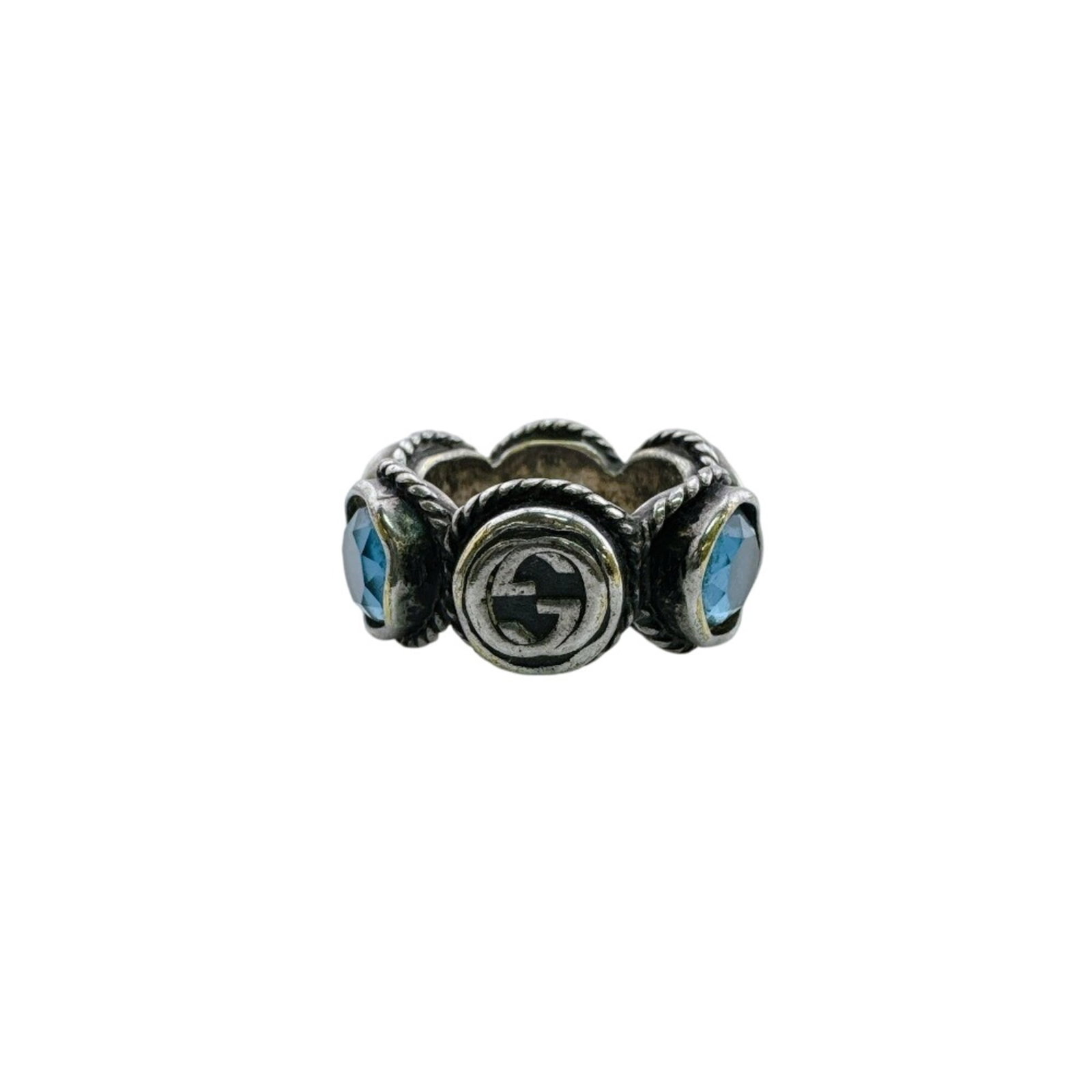GUCCI Band Ring Silver: GUCCI Band Ring Silver Silver band ring from Gucci, featuring a sleek and modern design. The ring bears visible scratches and scuffs, indicating it has been worn and used. In good condition, it remain