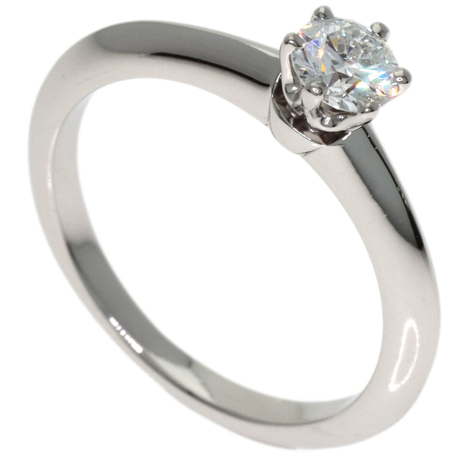 TIFFANY Band Ring Platinum 950: TIFFANY Band Ring Platinum 950 Platinum 950 Tiffany band ring features a diamond stone, setting the standard for luxury jewelry. Gently used with minor signs of wear, this item showcases a Very Good c