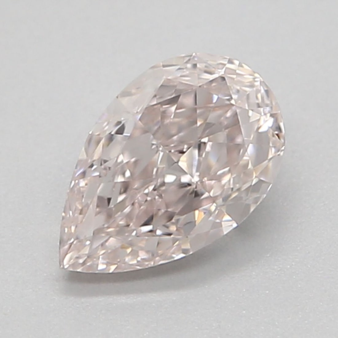 GIA Pear 0.41ct Light Pink VVS2 - Loose Natural Diamond: GIA Pear 0.41ct Light Pink VVS2 - Loose Natural Diamond GIA-certified Light Pink VVS2 diamond, a rare and exquisite natural Fancy color, boasts exceptional clarity and polish. Measuring 0.41 carats, t