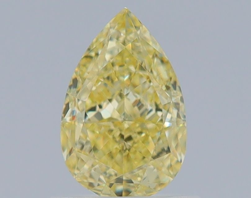 GIA Pear 1.01ct Fancy Yellow VVS2 - Loose Natural Diamond: GIA Pear 1.01ct Fancy Yellow VVS2 - Loose Natural Diamond GIA-certified Fancy Yellow diamond with a vibrant 1.01ct carat weight, exceptional VVS2 clarity, and EX polish, showcasing a beautiful