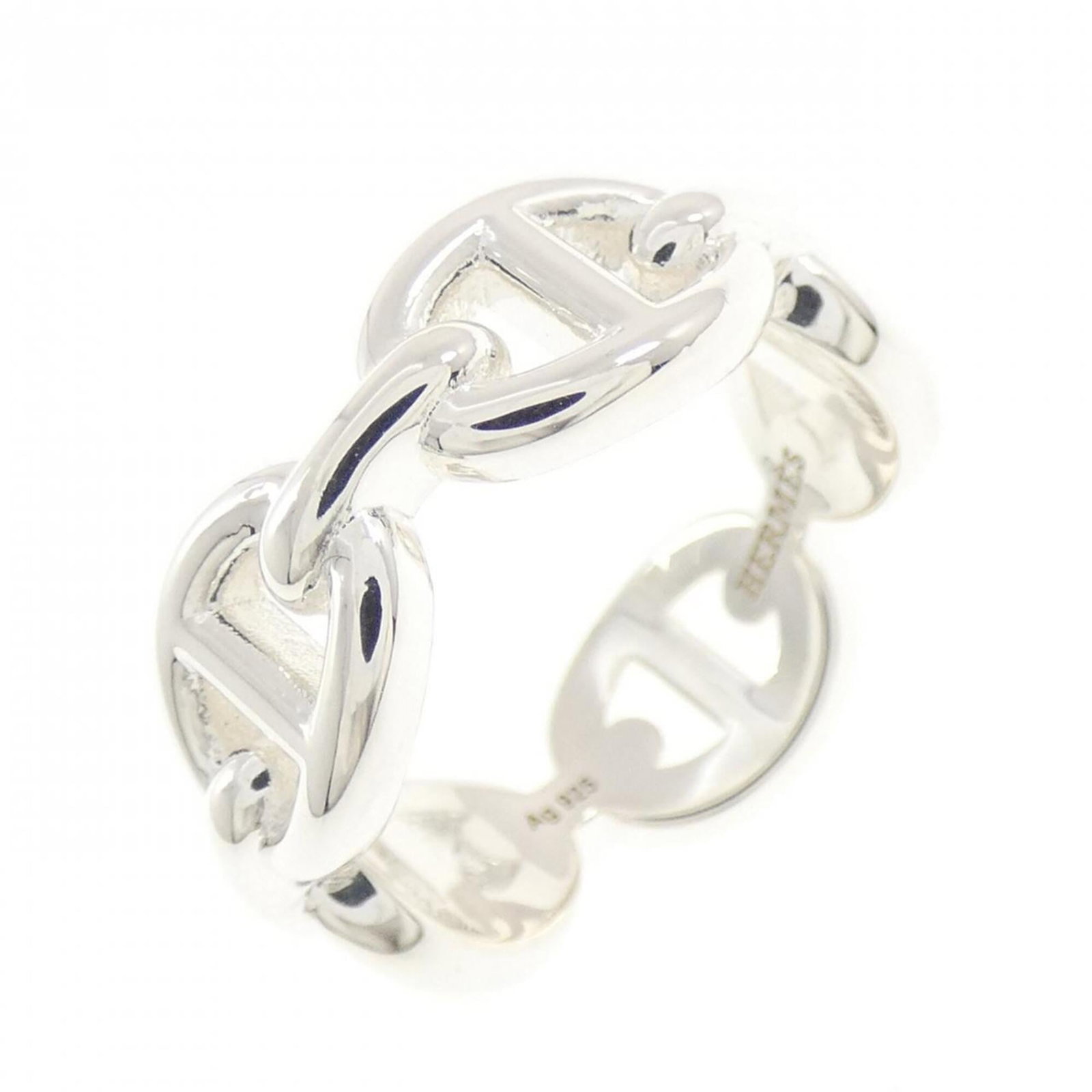 HERMES Band Ring Silver 925: HERMES Band Ring Silver 925 Silver 925 band ring from Hermes features a sleek design, bearing minor signs of wear. Gently used in very good condition, with small scratches or light marks present.