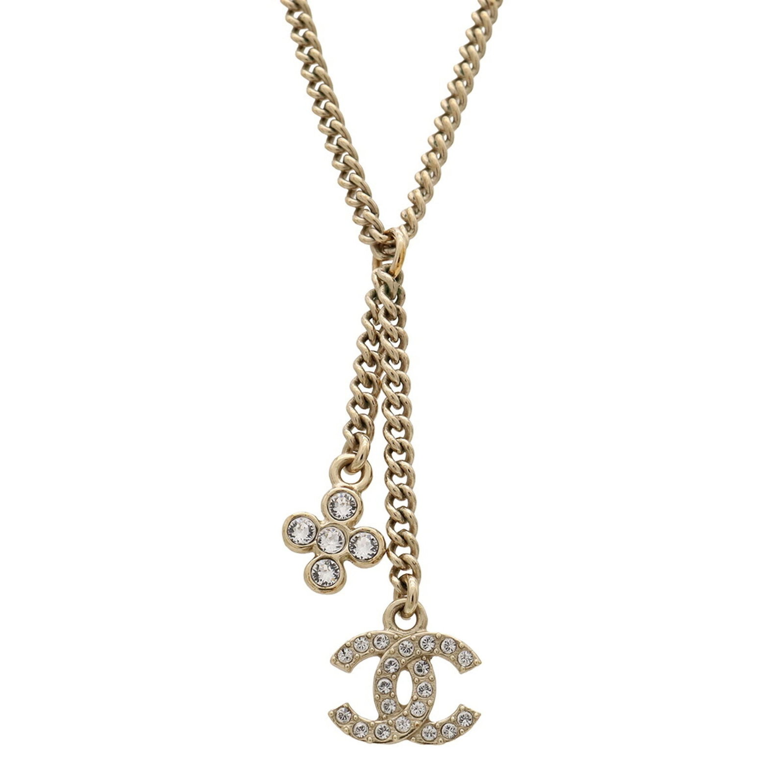 CHANEL Rhinestone Gold: CHANEL Rhinestone Gold Gold rhinestone pendant from CHANEL, featuring a delicate design. This gently used necklace has a 46 cm gold neck circumference and is made of rhinestone material, with minor si
