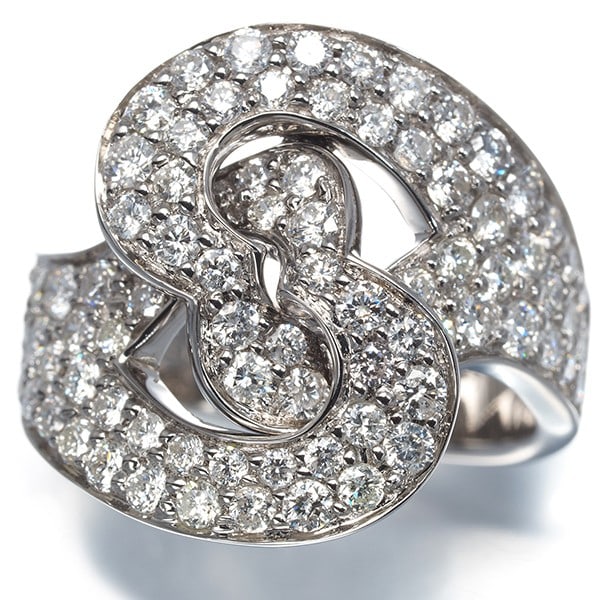 Diamond 1.60Ct Paved Openwork Ring 18K 750 White Gold: Diamond 1.60Ct Paved Openwork Ring 18K 750 White Gold 18k white gold pave ring showcases a stunning 1.60ct diamond, expertly set in an openwork design. The seven or eight diamonds surrounding the